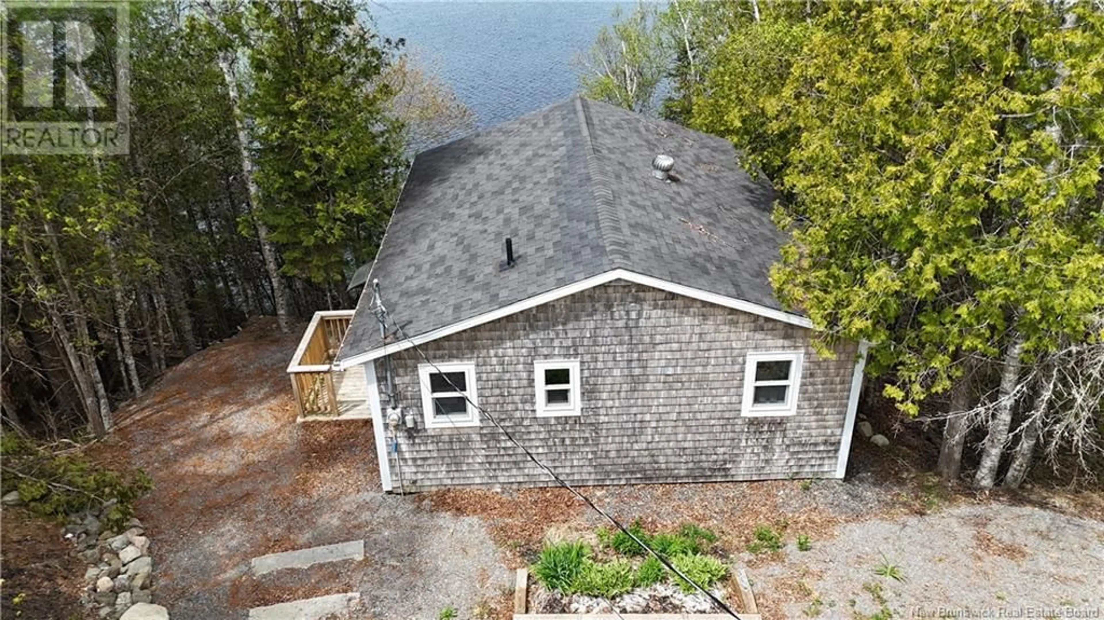 A pic from outside/outdoor area/front of a property/back of a property/a pic from drone, water/lake/river/ocean view for 29 KERRS LAKE RIGHT BRANCH ROAD, Bocabec New Brunswick E5B3K9