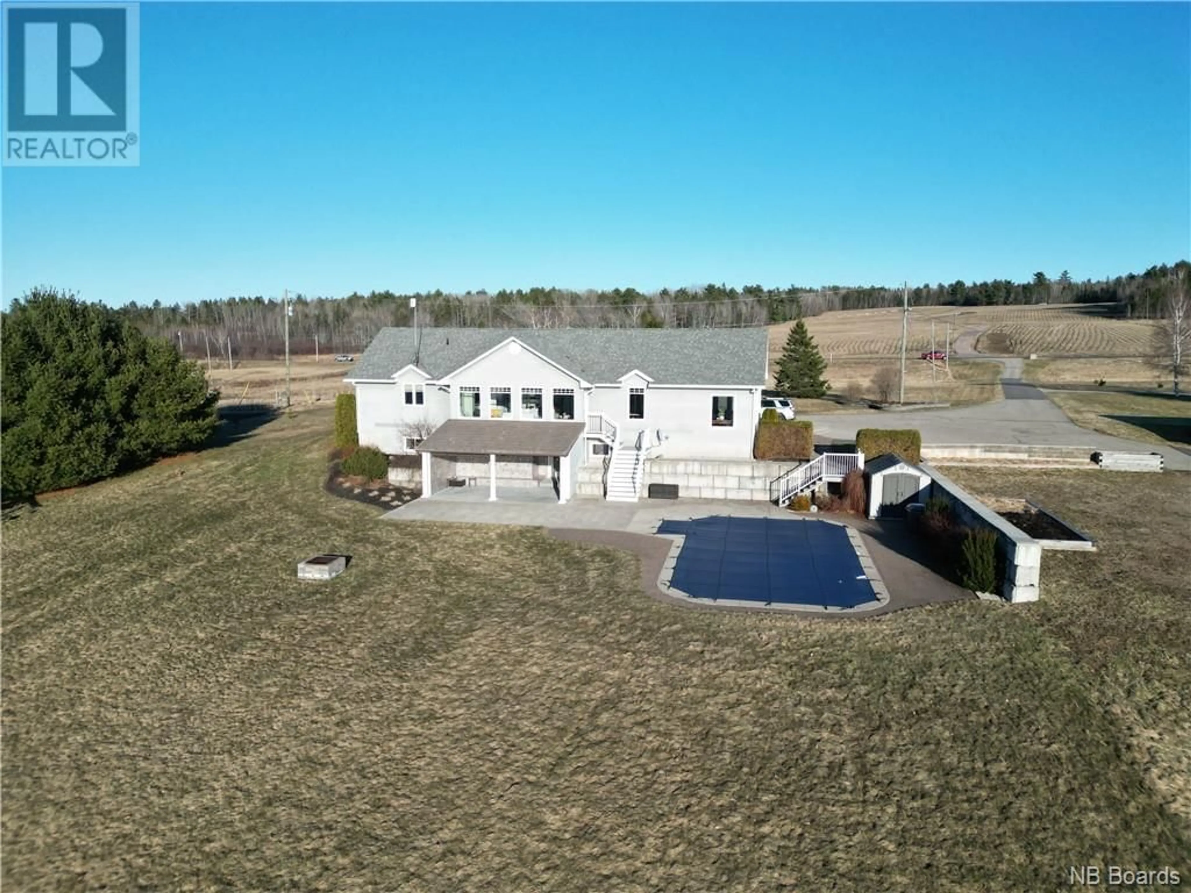 Frontside or backside of a home, the fenced backyard for 490 Route 710, Codys New Brunswick E4C1A2