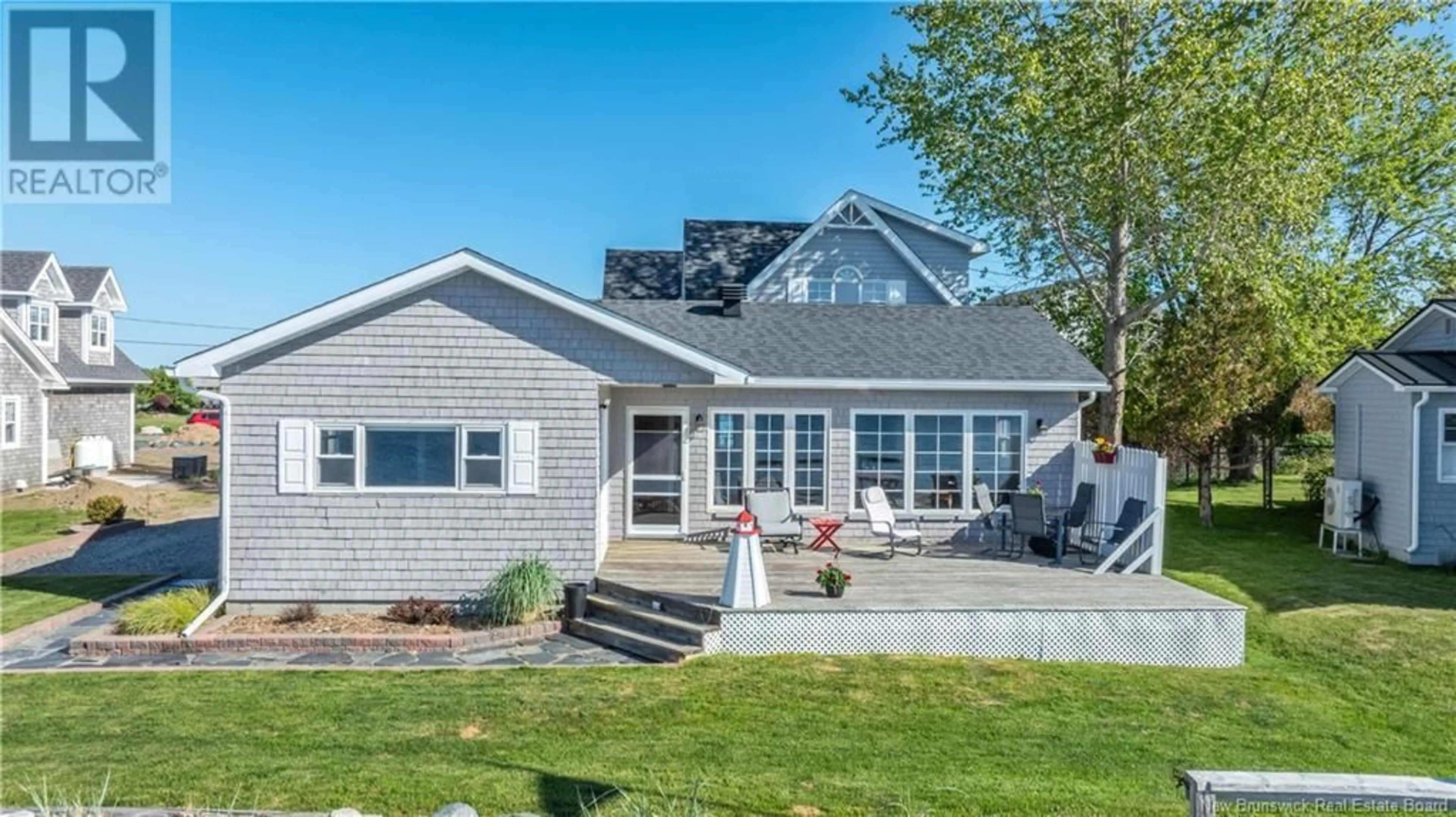 Home with vinyl exterior material, street for 31 PATRICK STREET, Saint Andrews New Brunswick E5B0A2