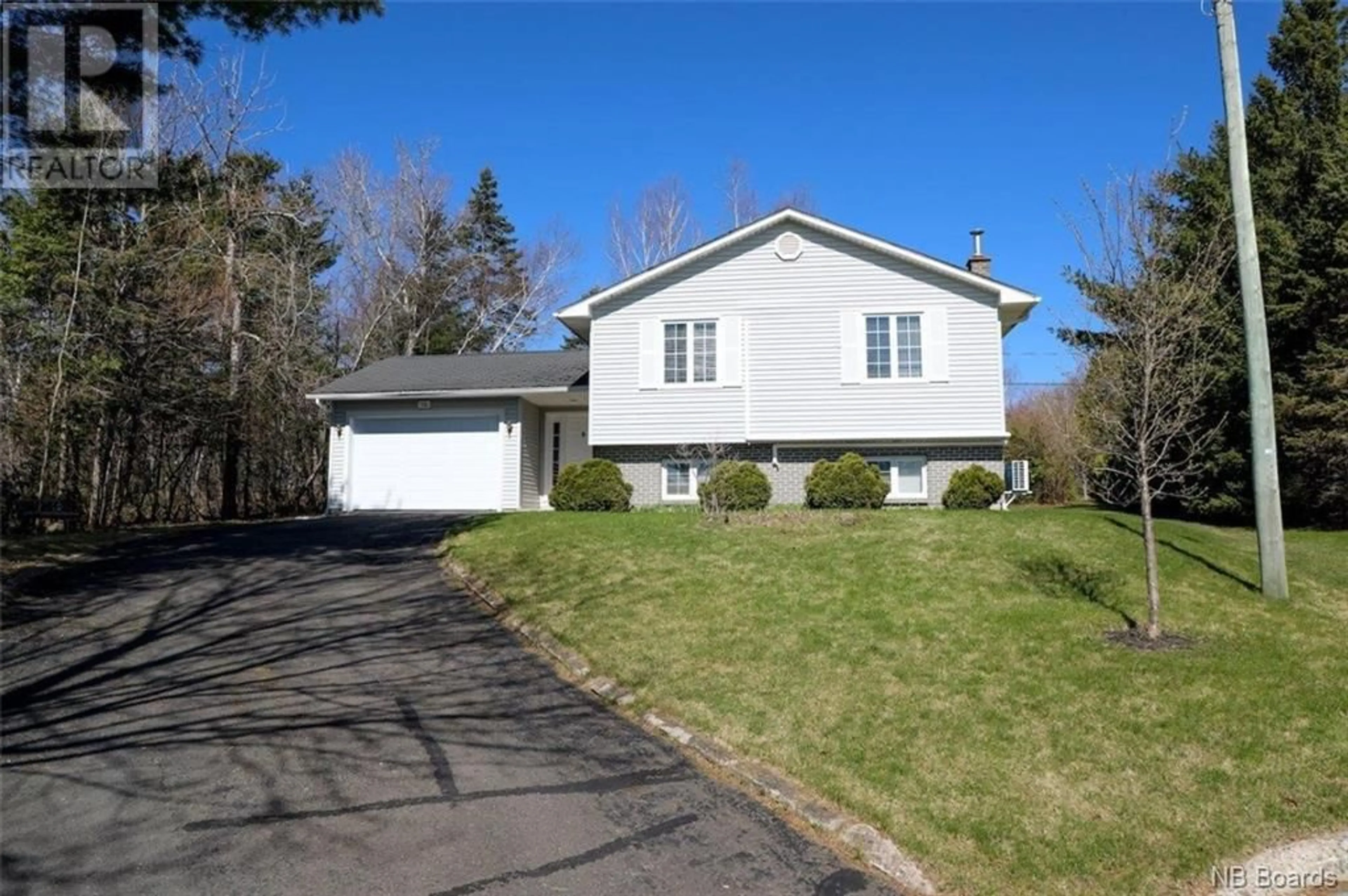 Frontside or backside of a home for 74 Derby Court, Fredericton New Brunswick E3B6K6