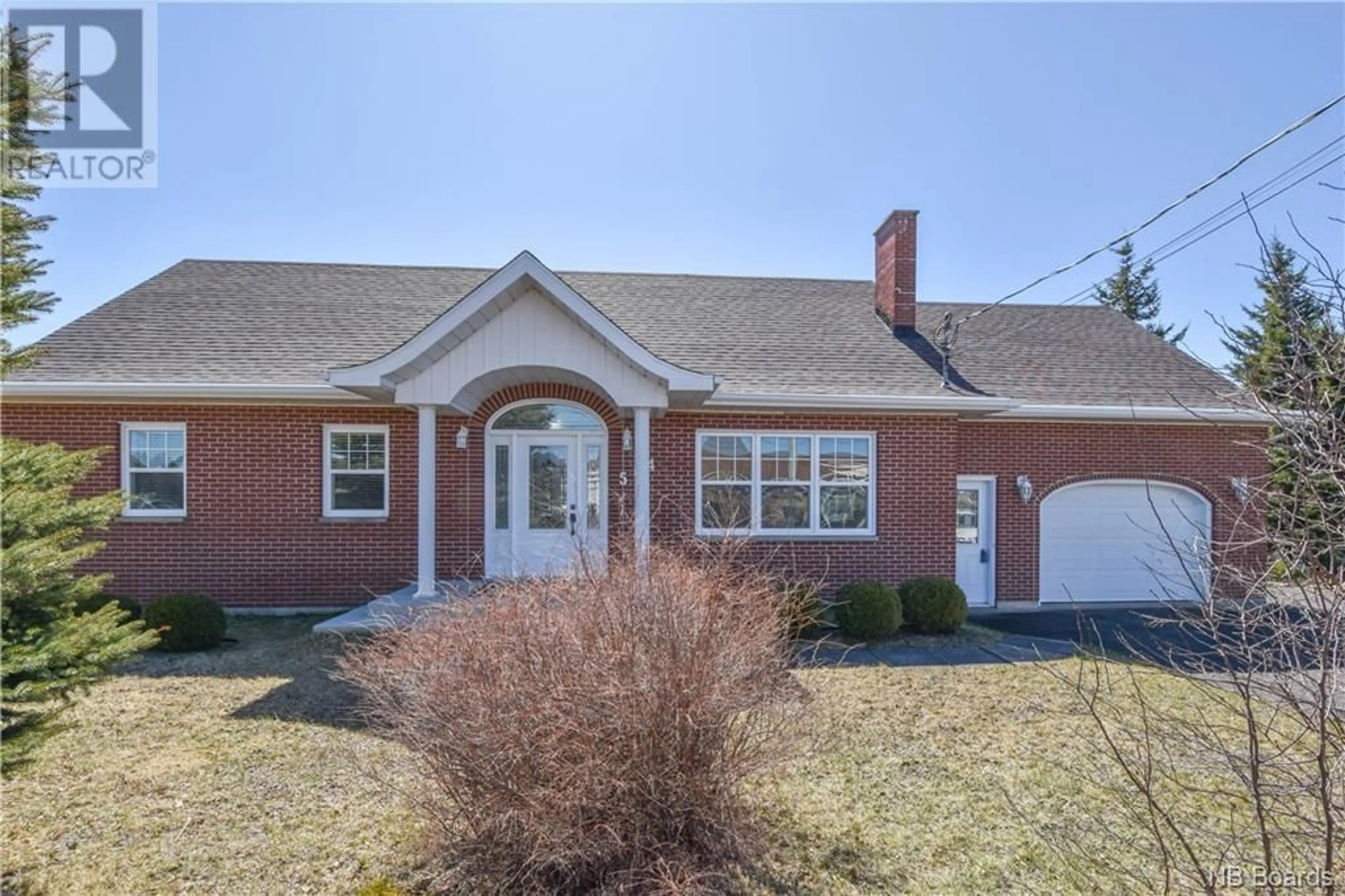 Home with brick exterior material for 584 Saulnier Ouest Street, Tracadie New Brunswick E1X1B5