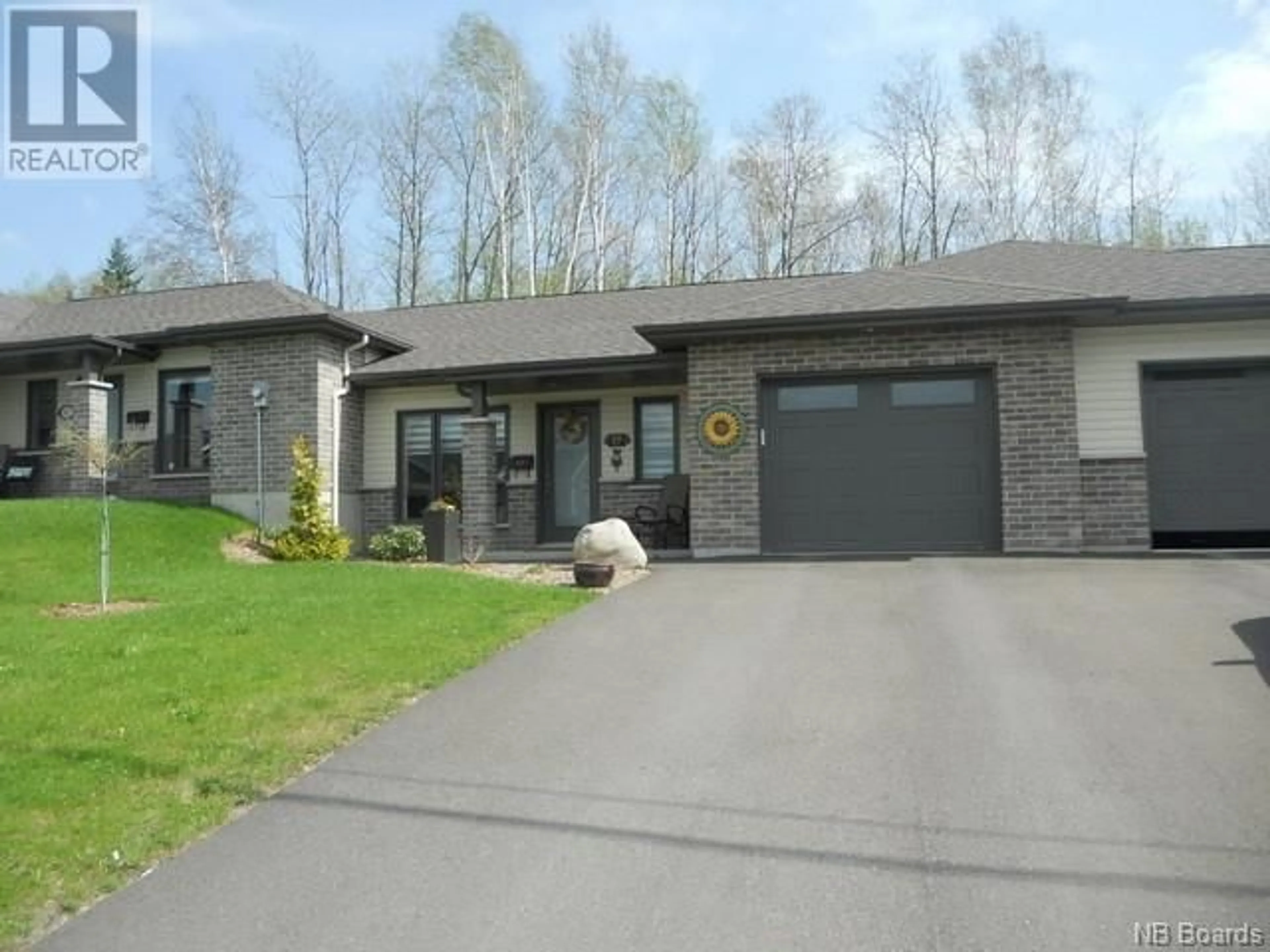 Frontside or backside of a home for 57 Réal Street Unit# 102, Edmundston New Brunswick E3V0E2