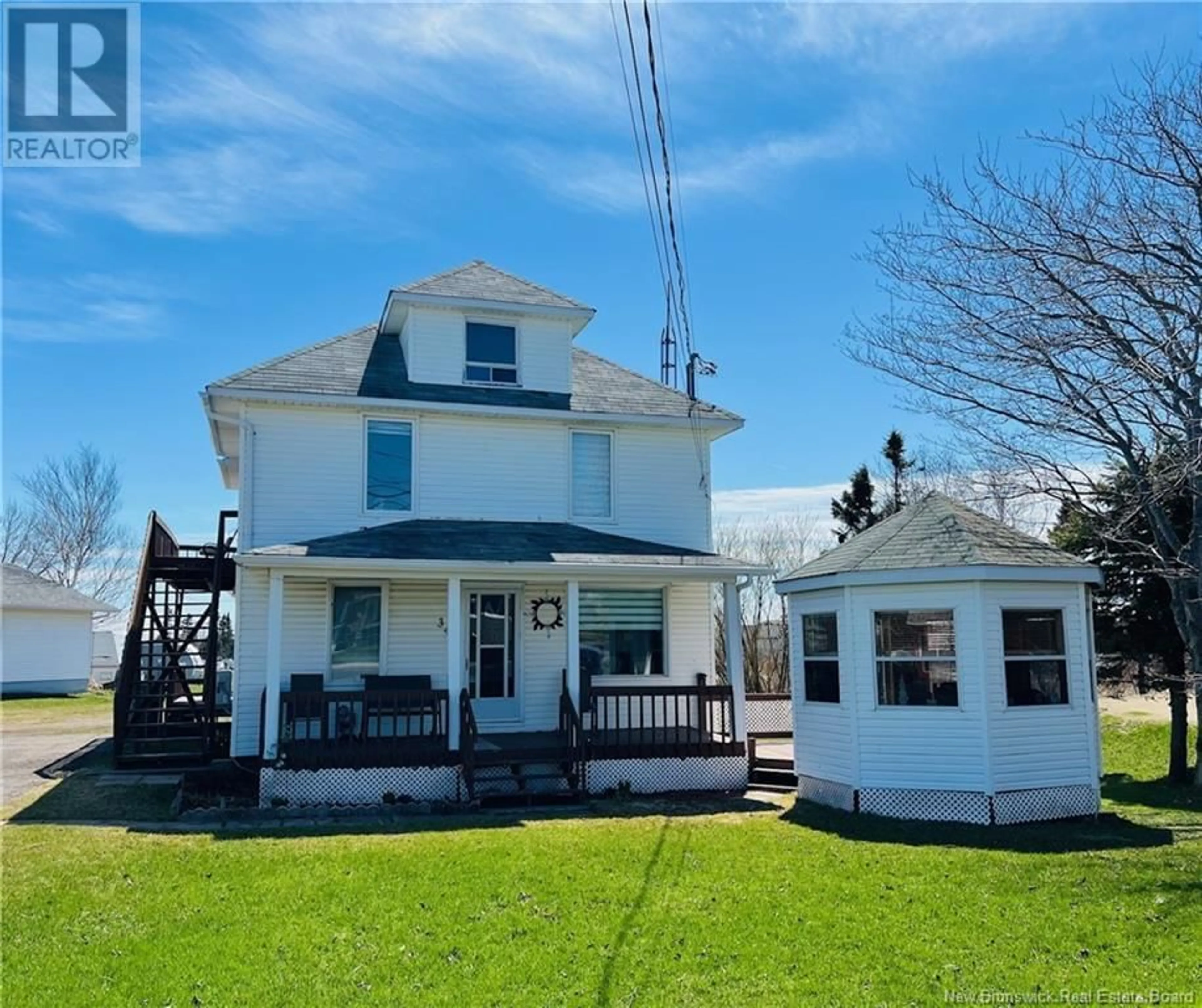 Frontside or backside of a home, cottage for 34 Rue Principale, Lamèque New Brunswick E8T1M4