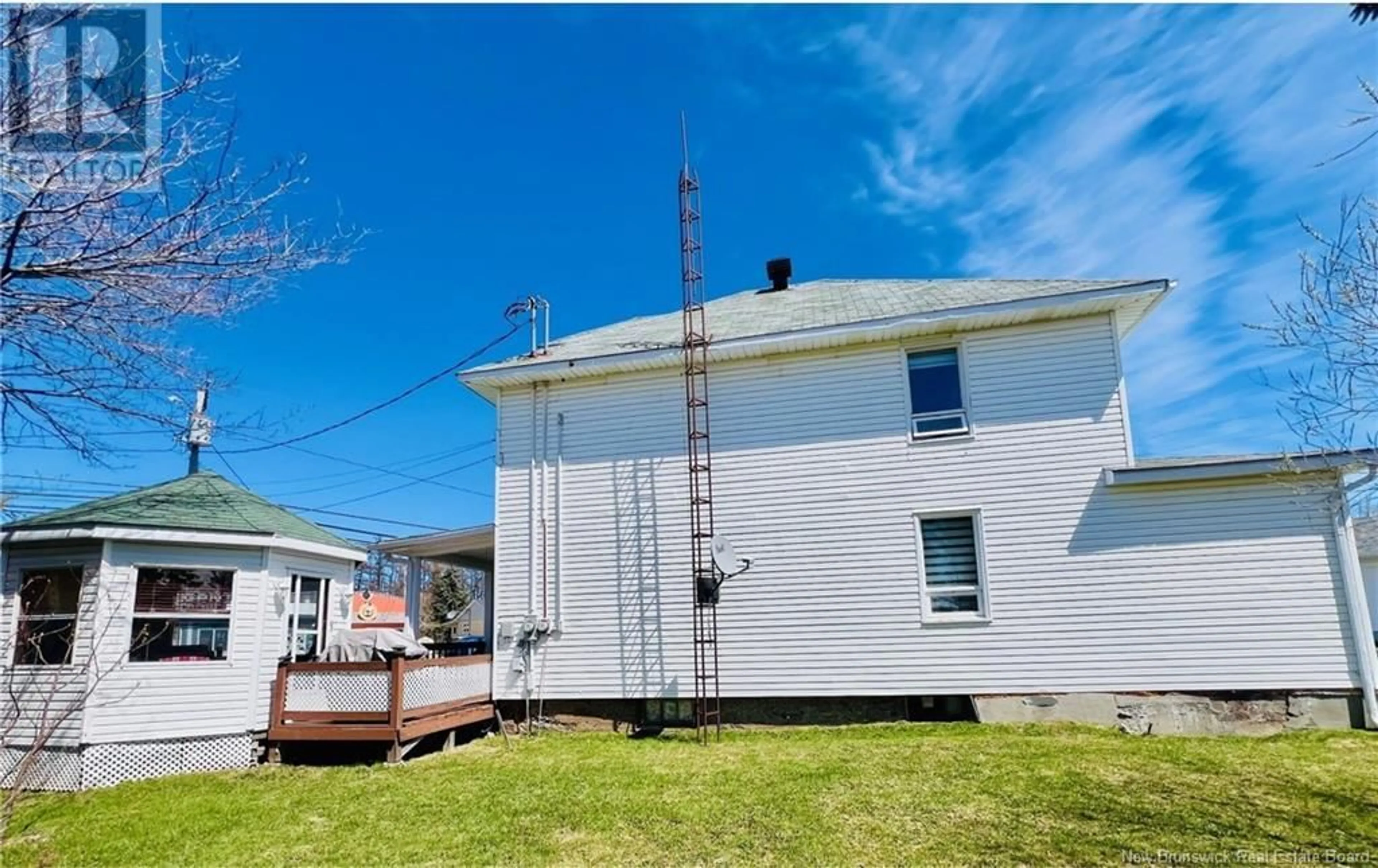 Frontside or backside of a home, the front or back of building for 34 Rue Principale, Lamèque New Brunswick E8T1M4