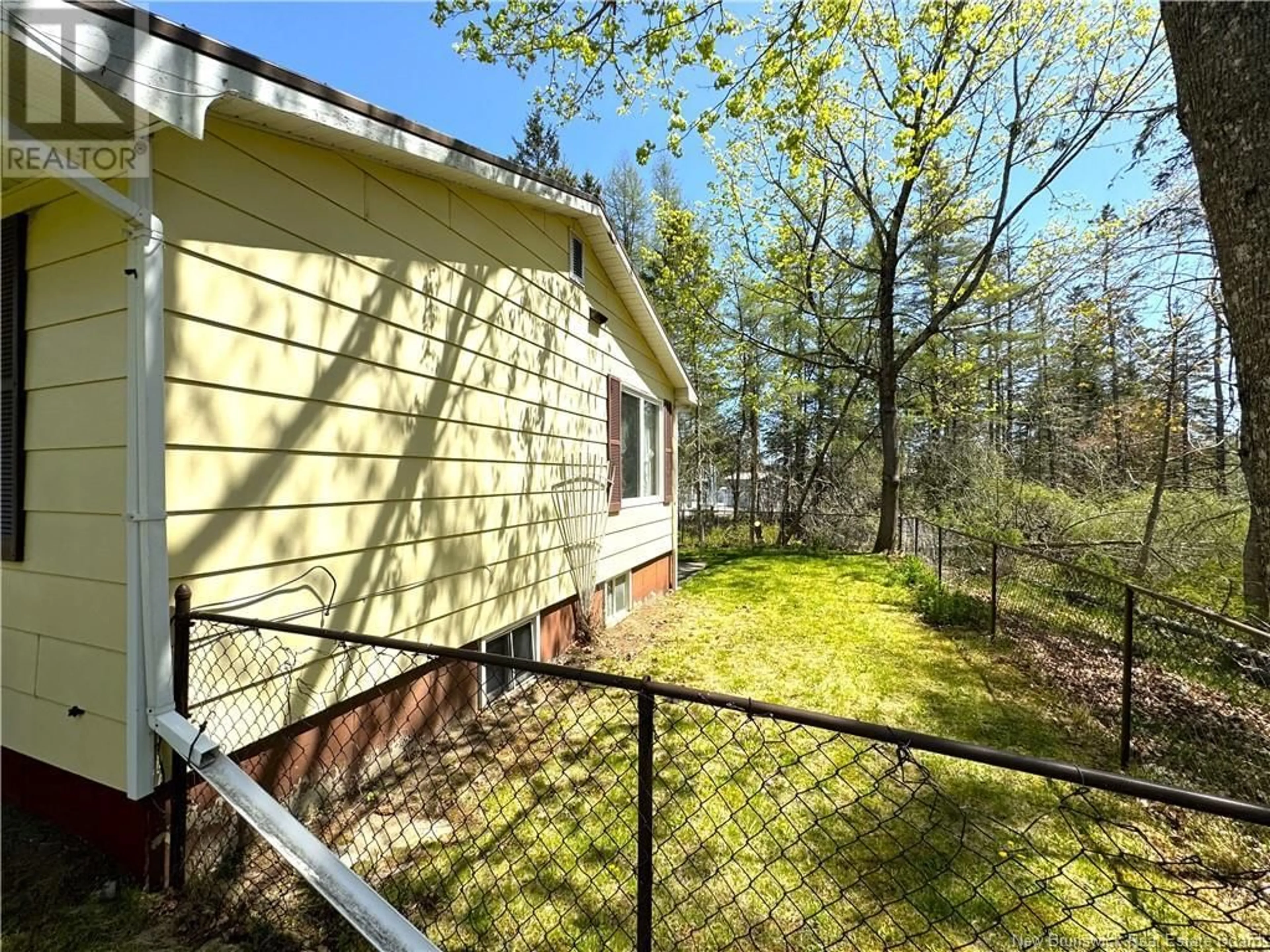 Fenced yard for 23 Maple Court, Saint Andrews New Brunswick E5B2M1