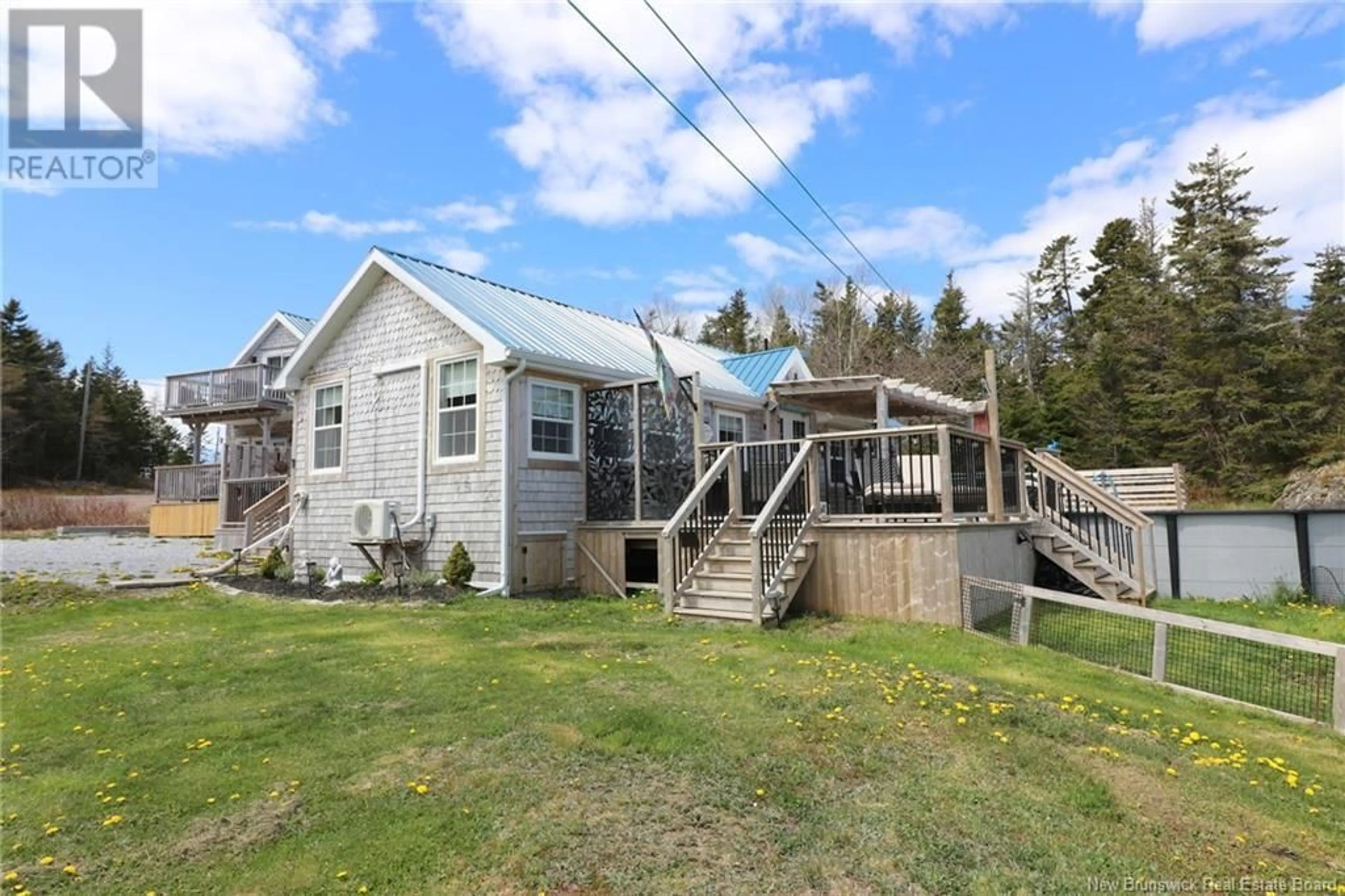 Frontside or backside of a home, cottage for 11 Cook Road, Grand Manan New Brunswick E5G4E3