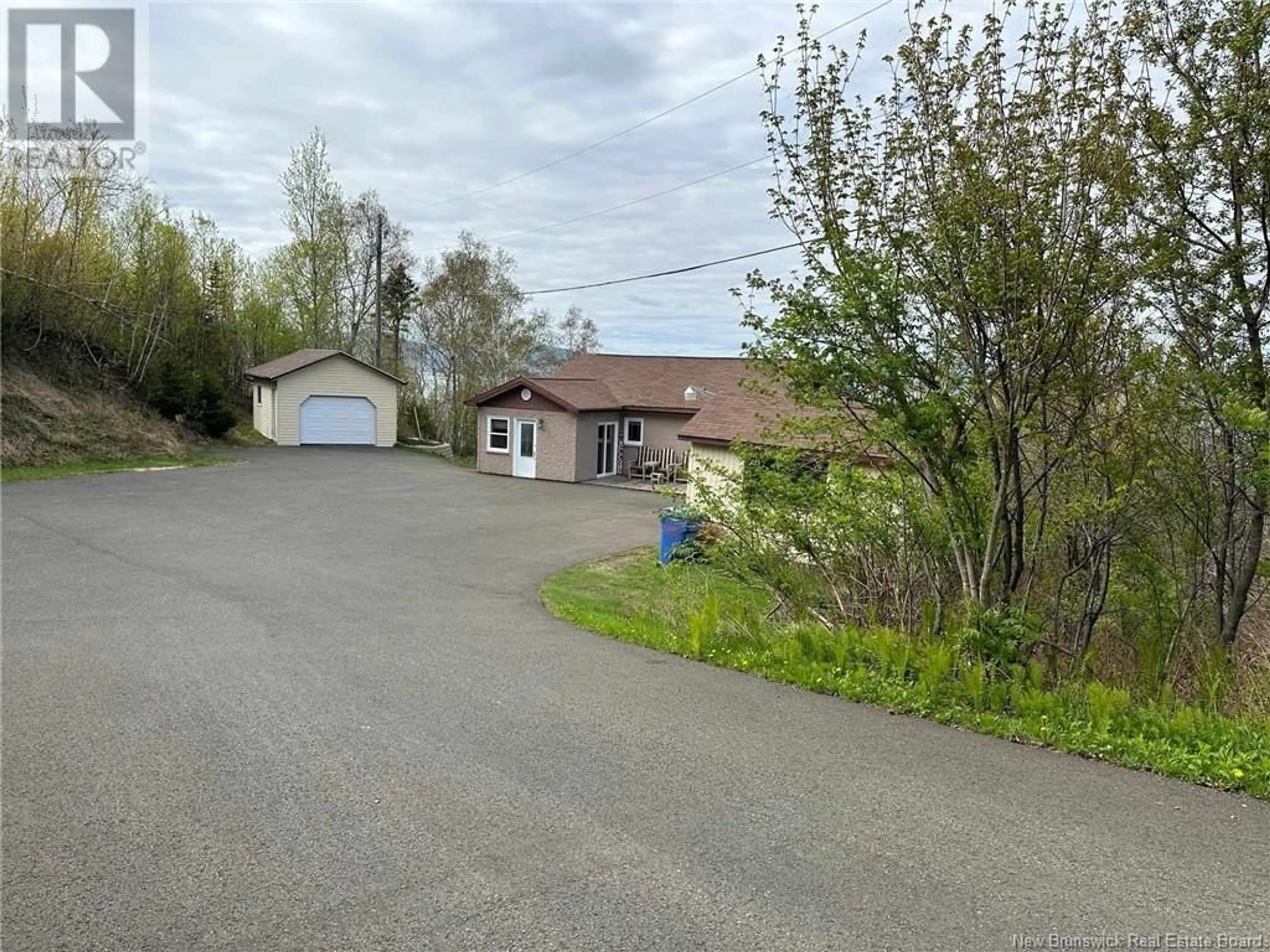 Frontside or backside of a home, the street view for 100 Brent Lane, Dalhousie New Brunswick E8C1G4