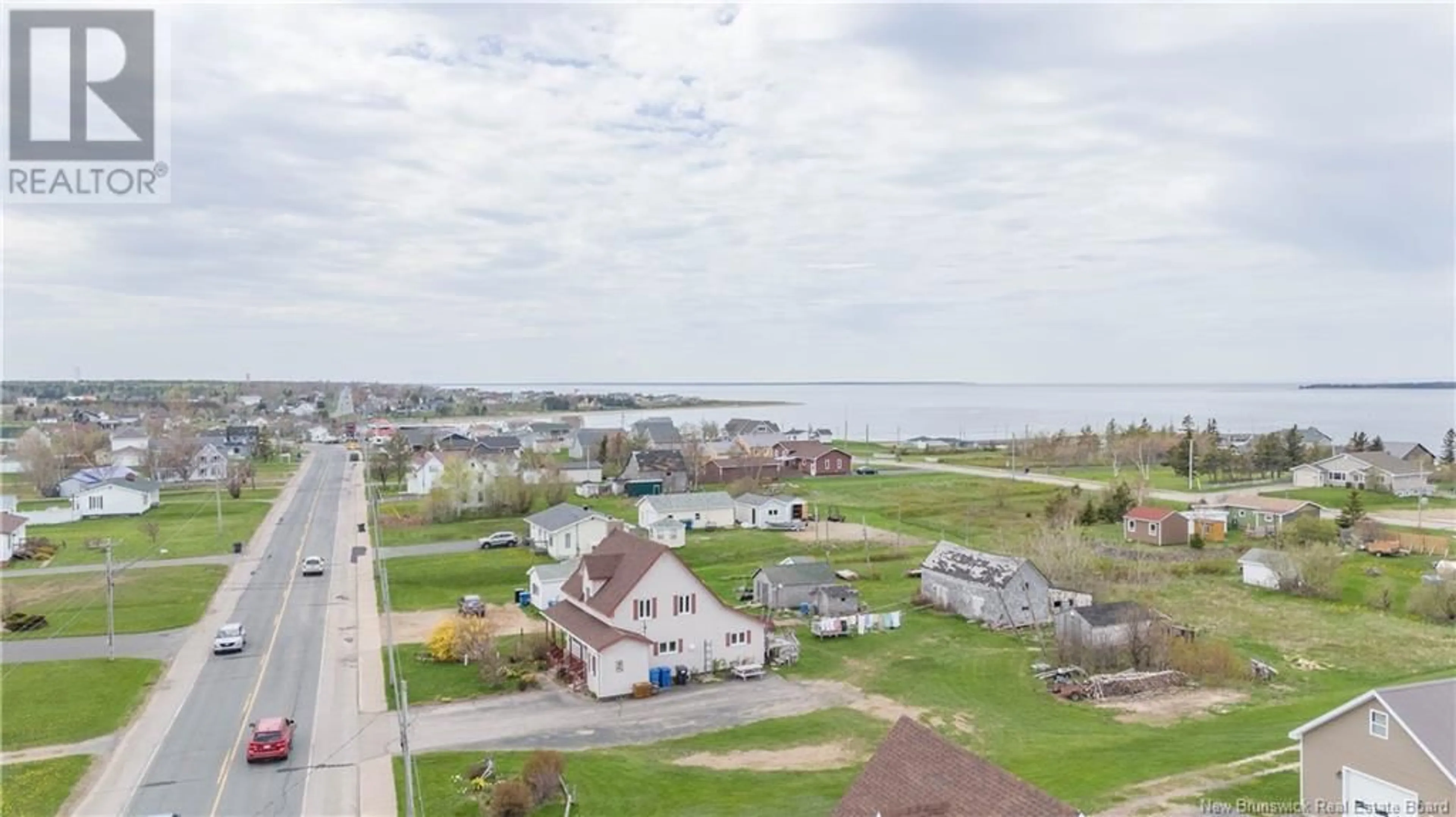 A pic from exterior of the house or condo, the street view for 7705 Saint-Paul Street, Bas-Caraquet New Brunswick E1W6C1