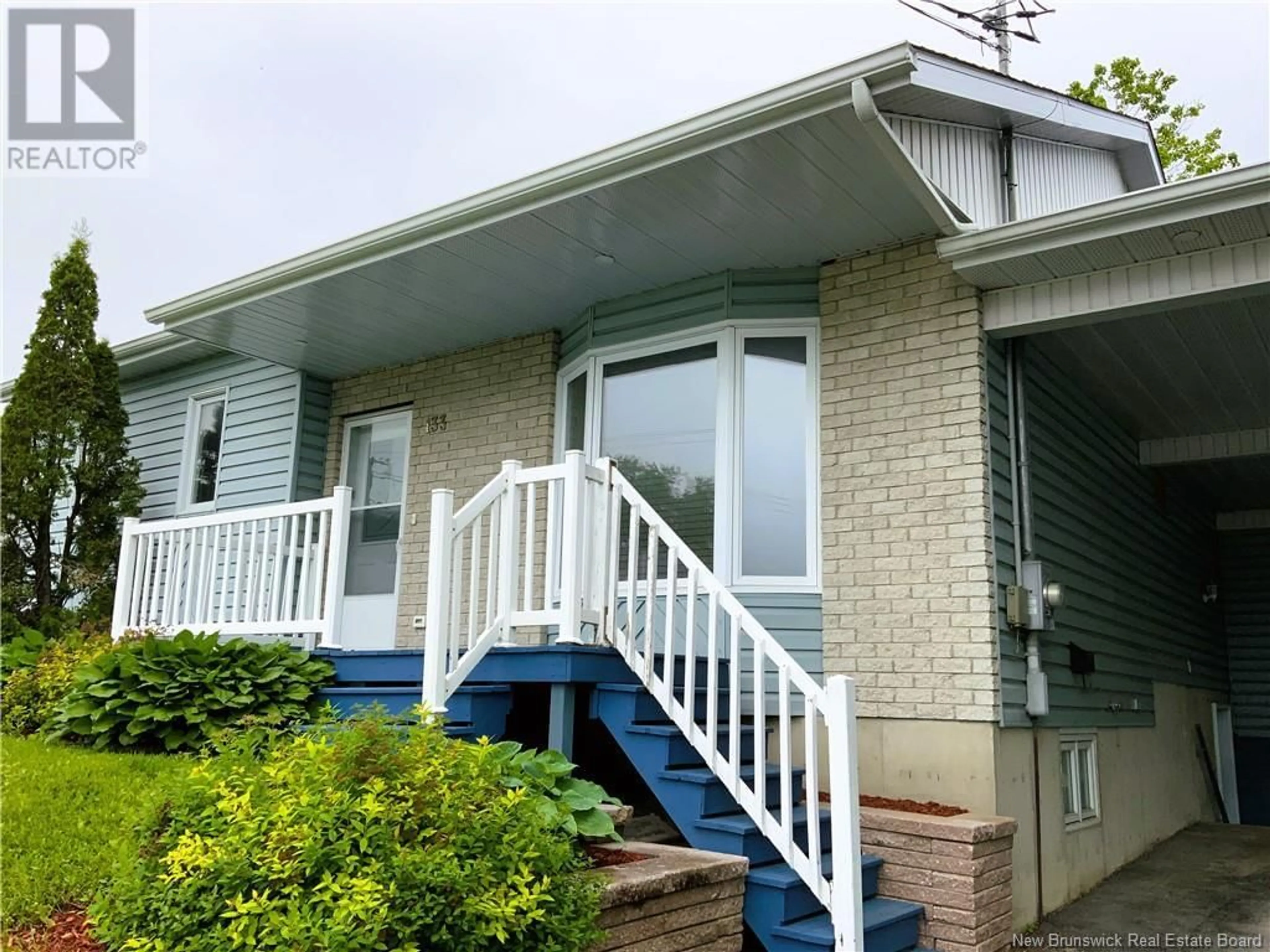 Home with vinyl exterior material for 133 du Pouvoir Road, Edmundston New Brunswick E3V2Y2