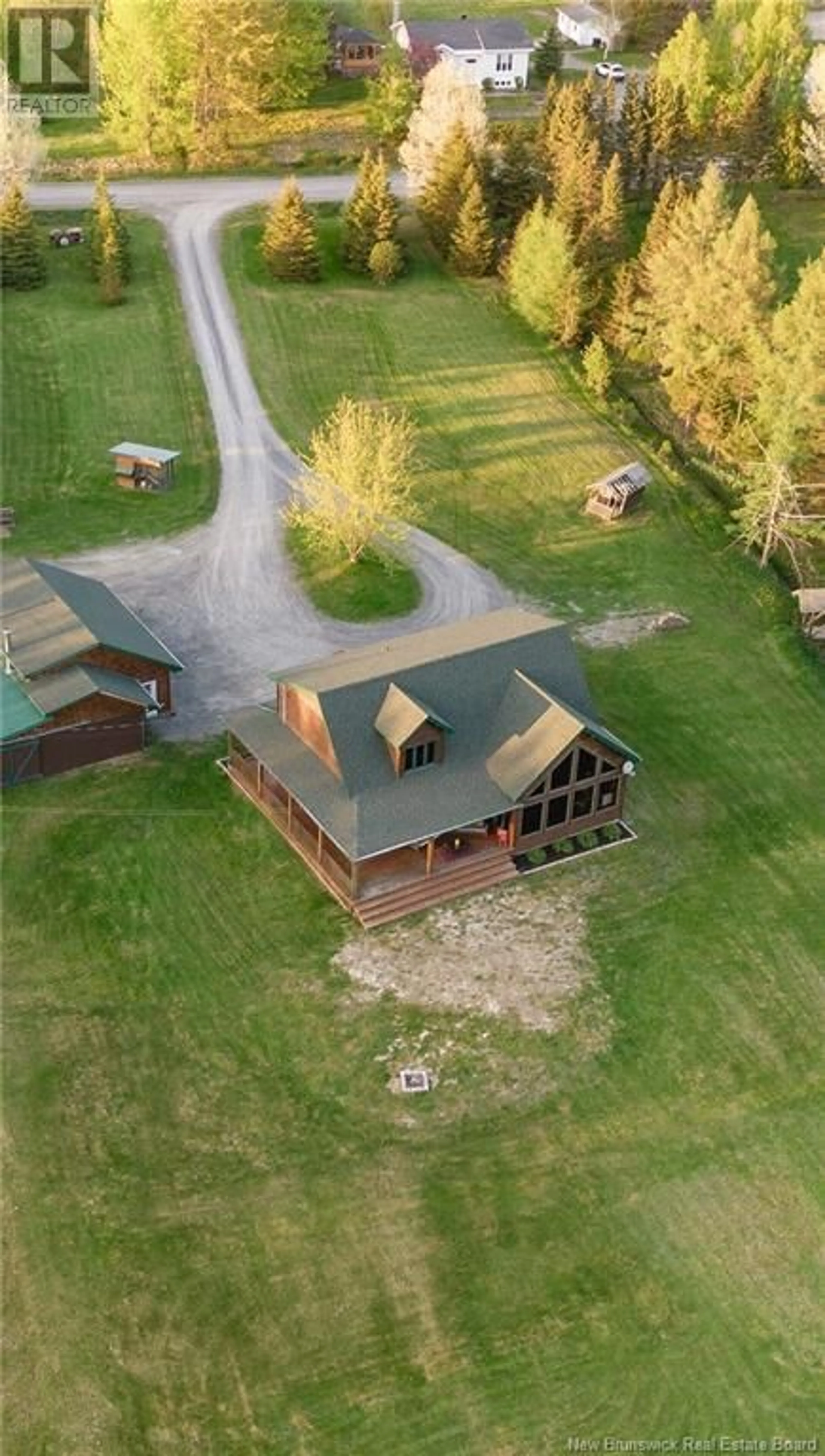 Frontside or backside of a home, the front or back of building for 32 Bellefleur Street, Saint-Jacques New Brunswick E7B2B1