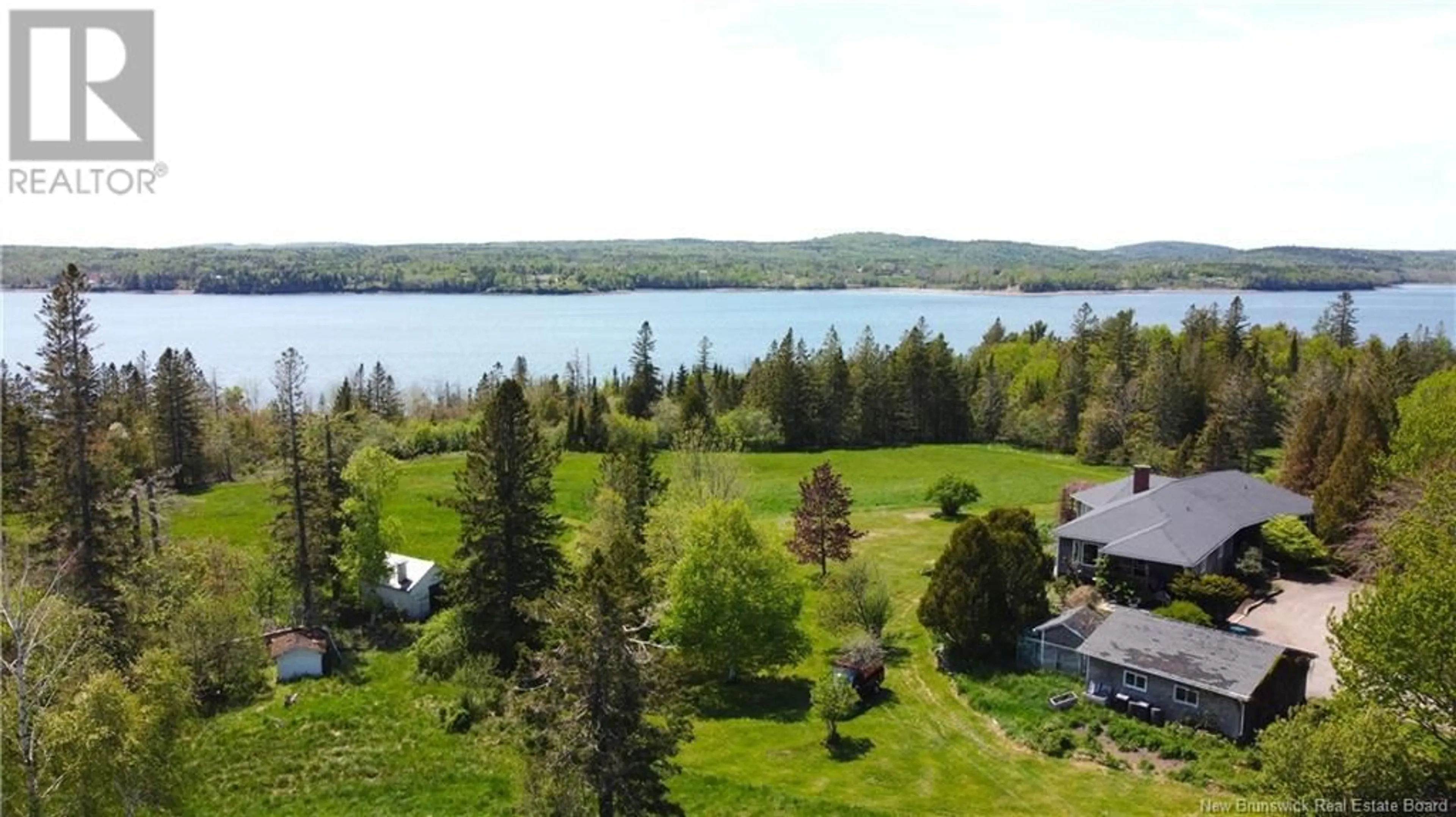 A pic from outside/outdoor area/front of a property/back of a property/a pic from drone, water/lake/river/ocean view for 92 BANTRY BAY FARM ROAD, Bayside New Brunswick E5B2V9
