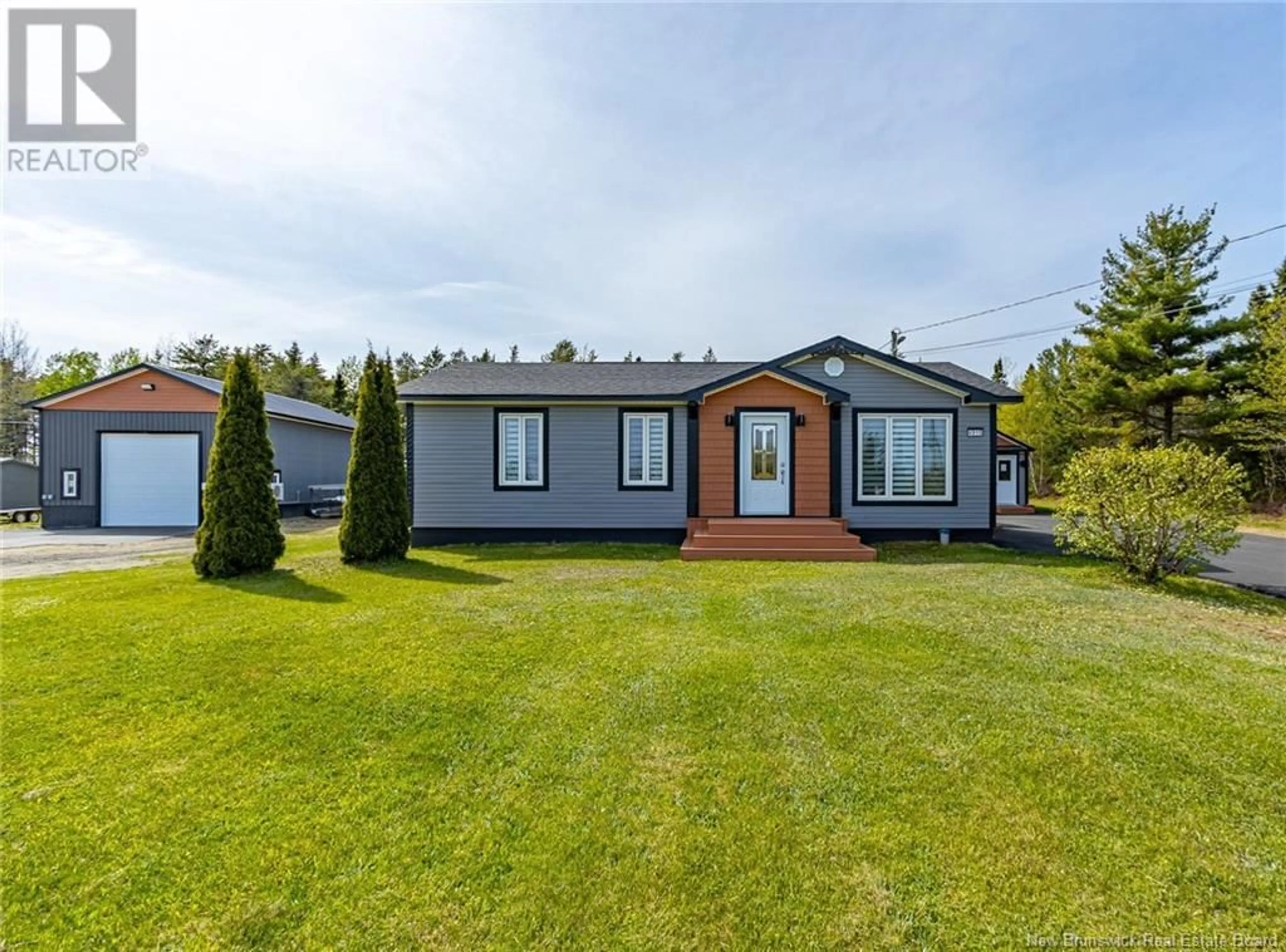 Home with vinyl exterior material, street for 4915 ROUTE 11, Brantville New Brunswick E9H1M3