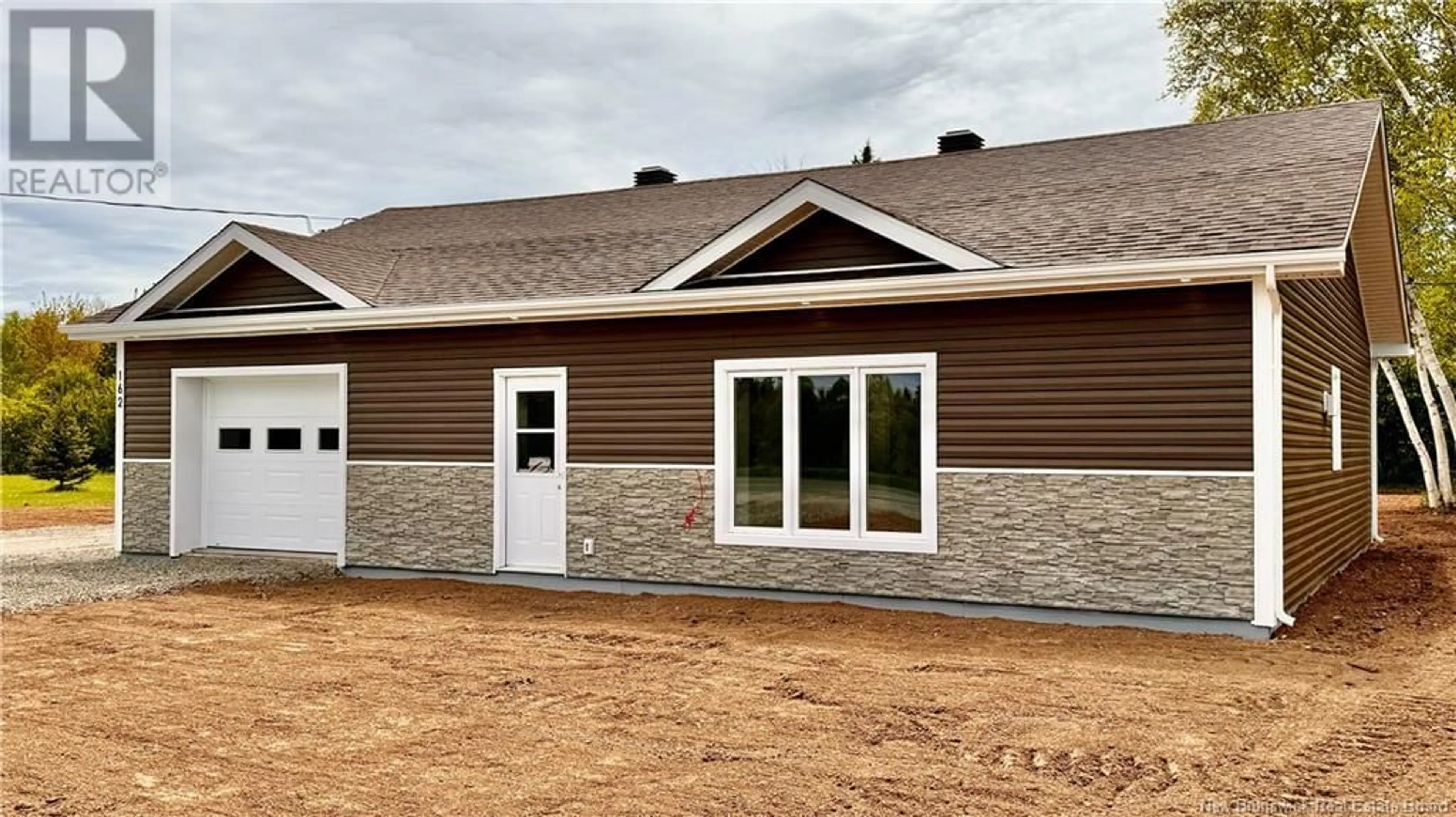 Home with vinyl exterior material for 162 Principale, Pointe-Verte New Brunswick E8J2W5