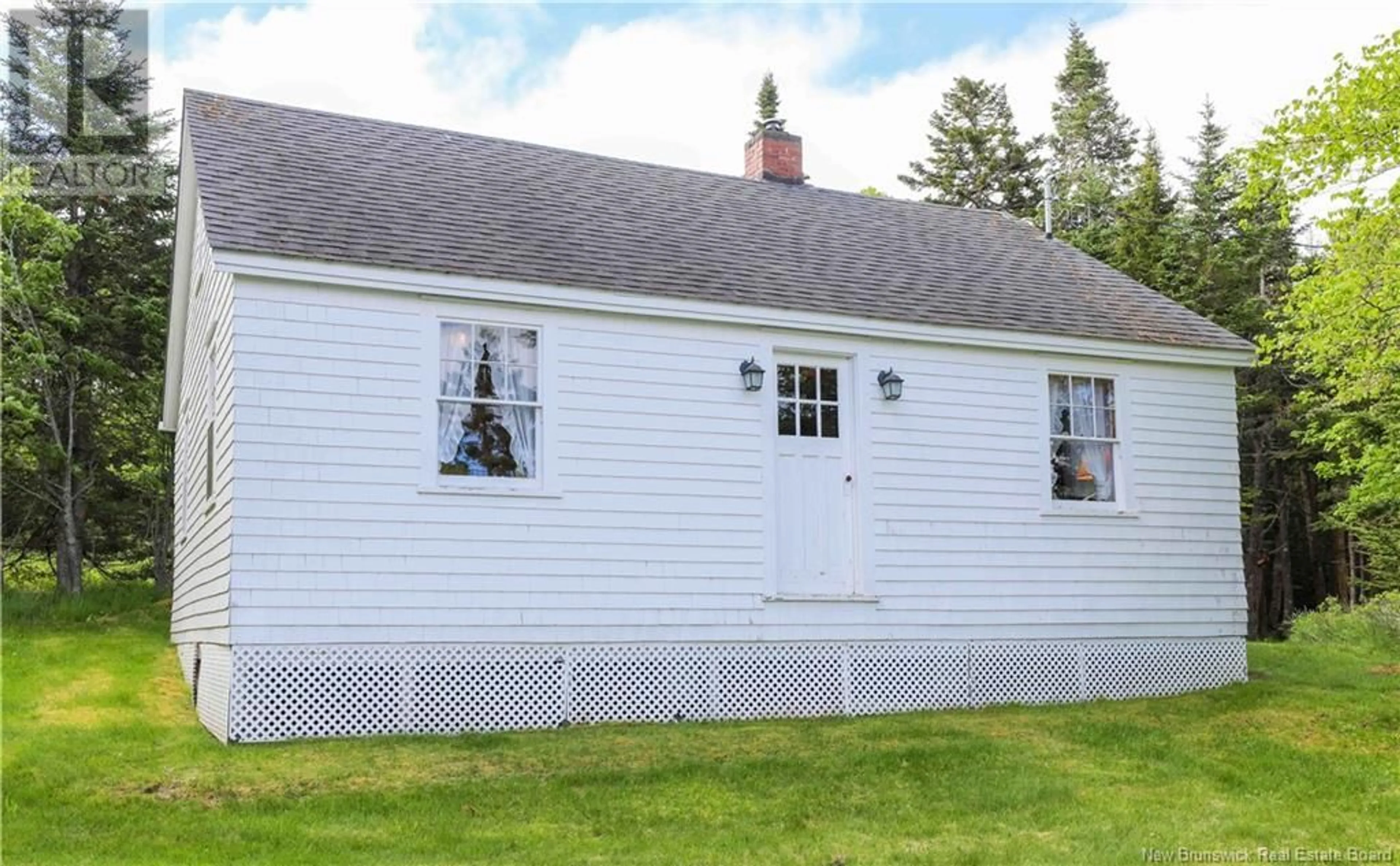 Home with vinyl exterior material for 33 Crow Island Road, Chance Harbour New Brunswick E5J2A3