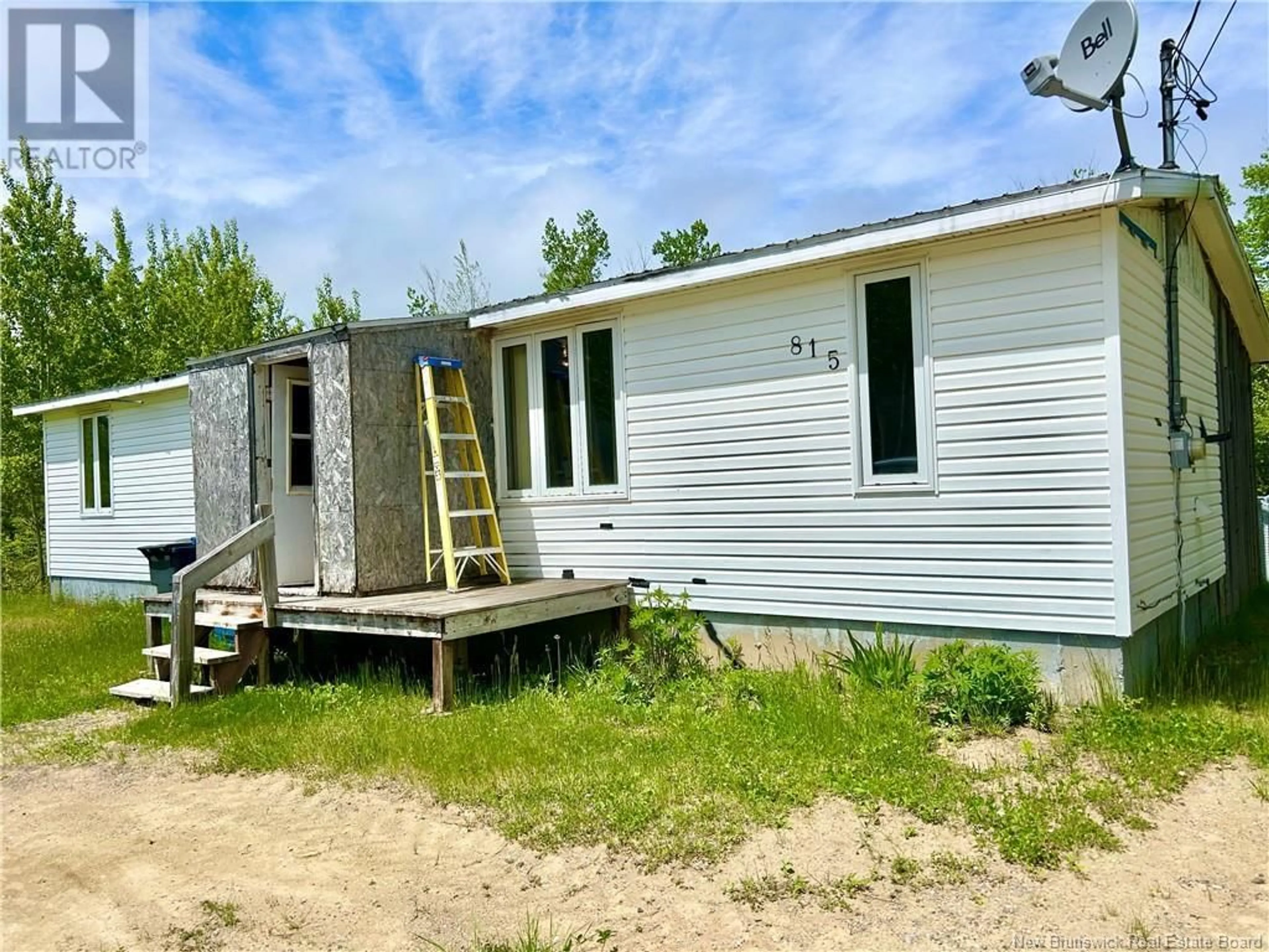 Frontside or backside of a home for 815 Rte 303, Village-Des-Poirier New Brunswick E8N1N2