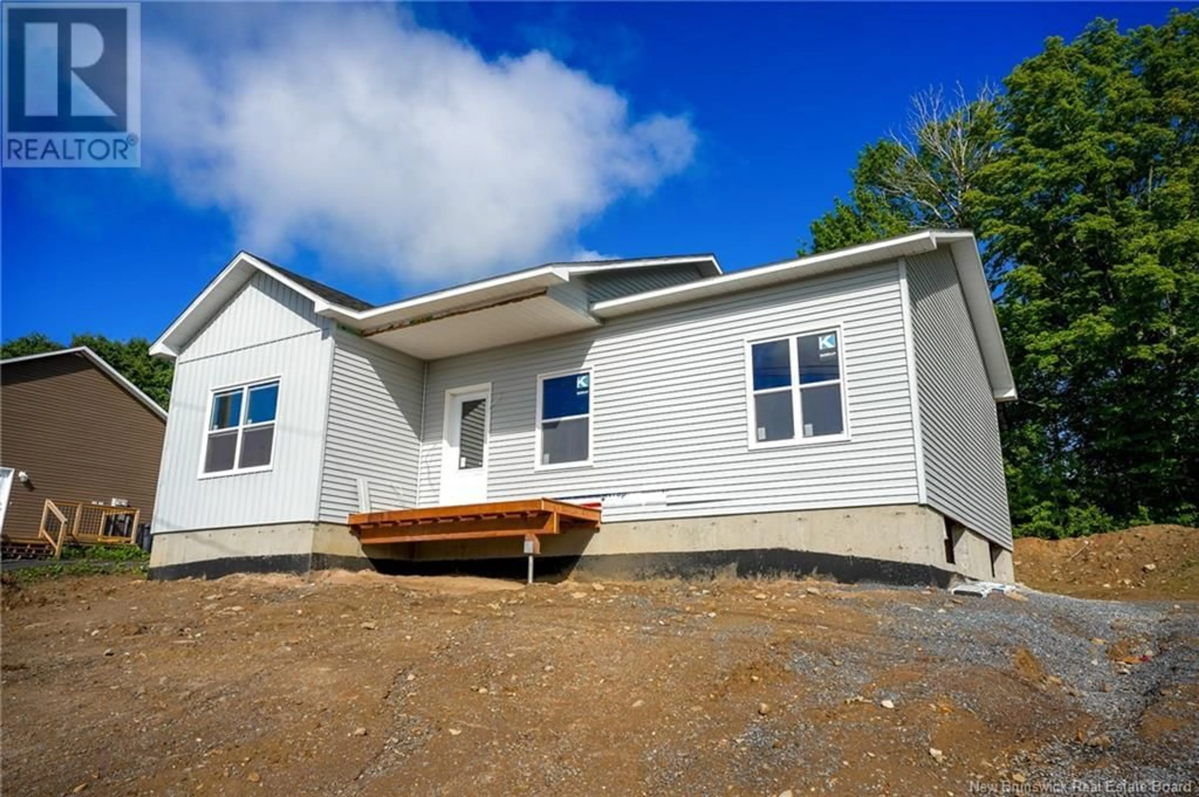 Home with vinyl exterior material for 305 Gilridge Drive, Fredericton New Brunswick E3G0G2