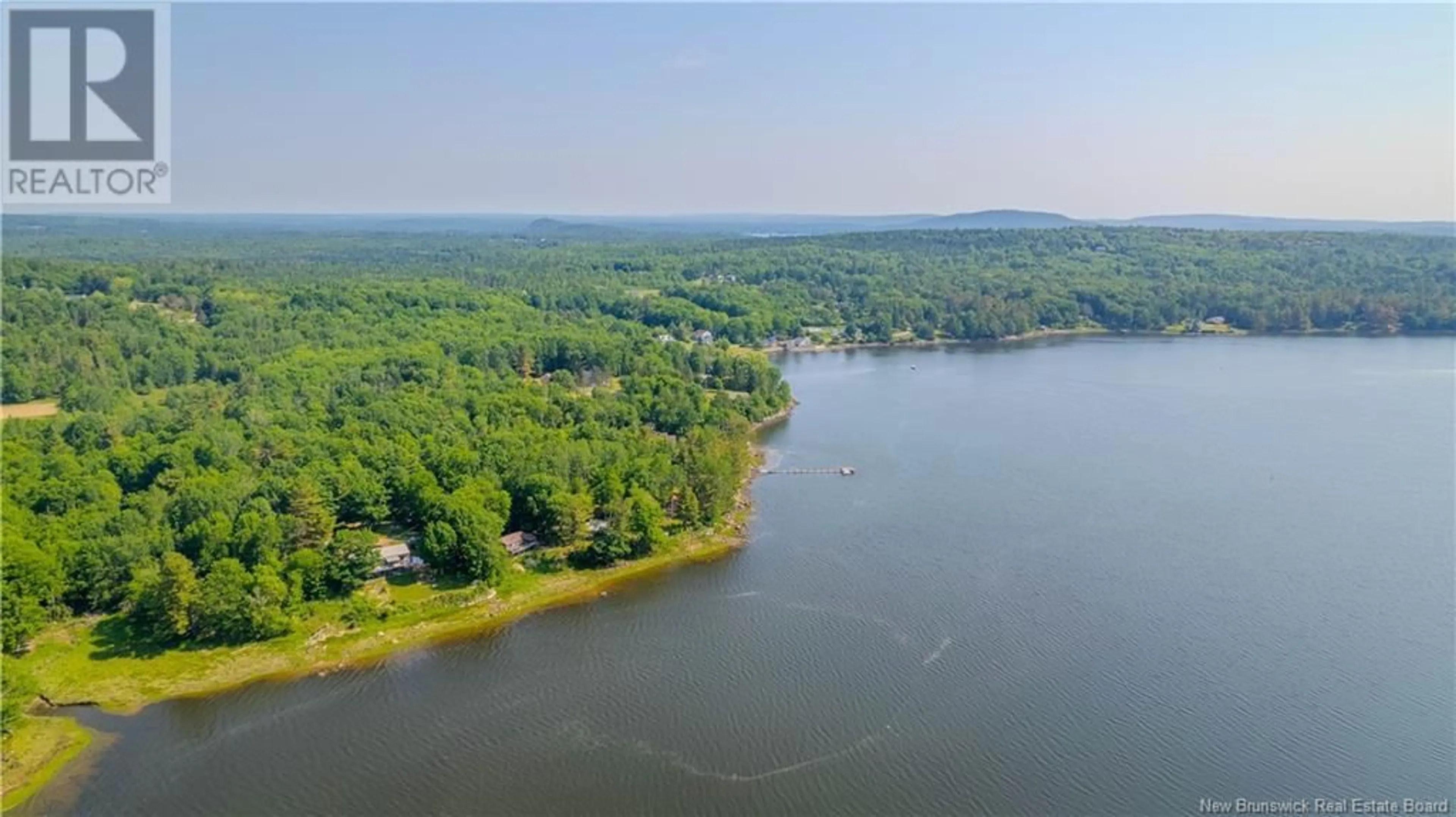A pic from outside/outdoor area/front of a property/back of a property/a pic from drone, water/lake/river/ocean view for 22 MARKS POINT ROAD, Dufferin New Brunswick E3L3P8