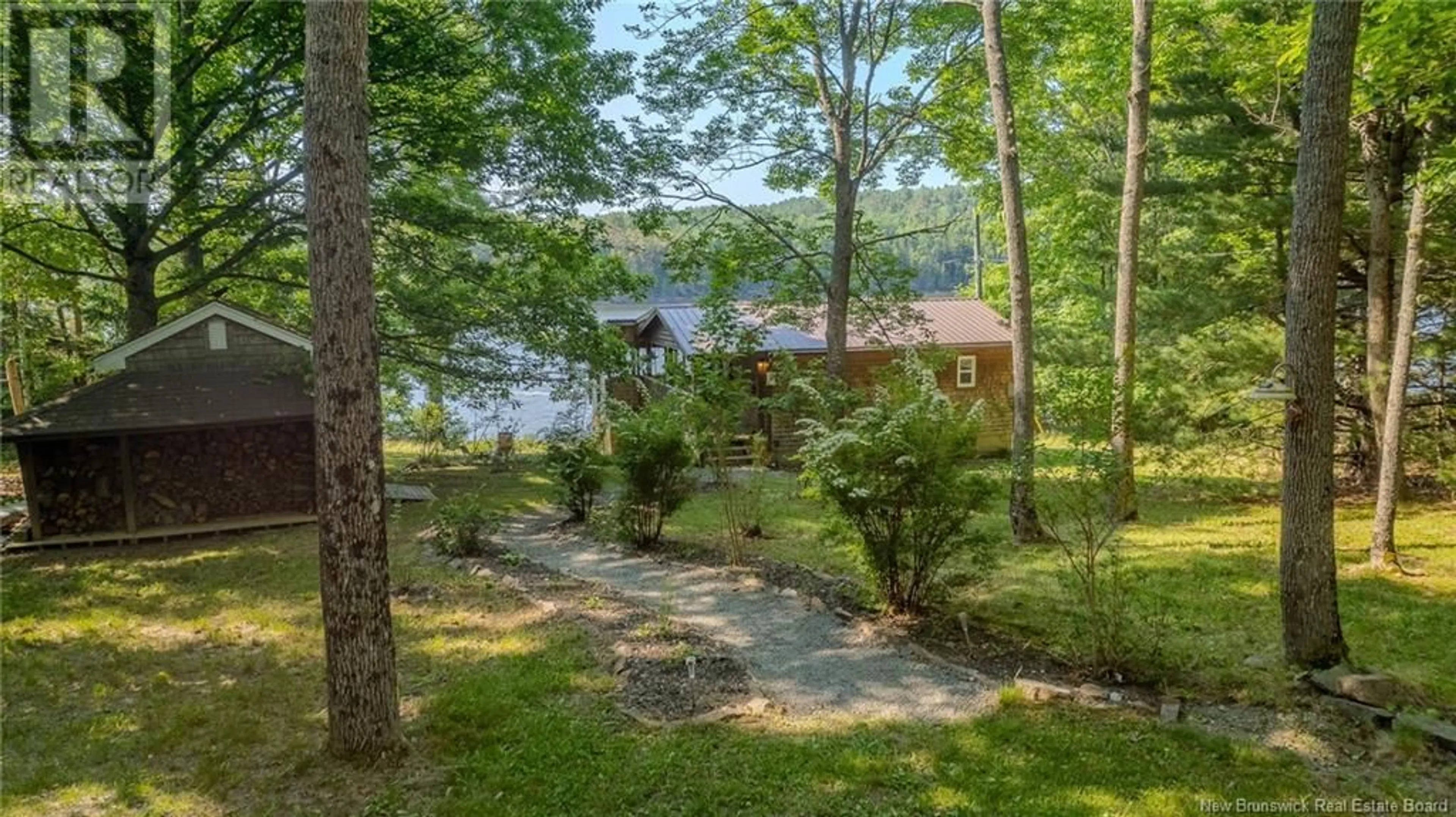 A pic from outside/outdoor area/front of a property/back of a property/a pic from drone, water/lake/river/ocean view for 22 MARKS POINT ROAD, Dufferin New Brunswick E3L3P8
