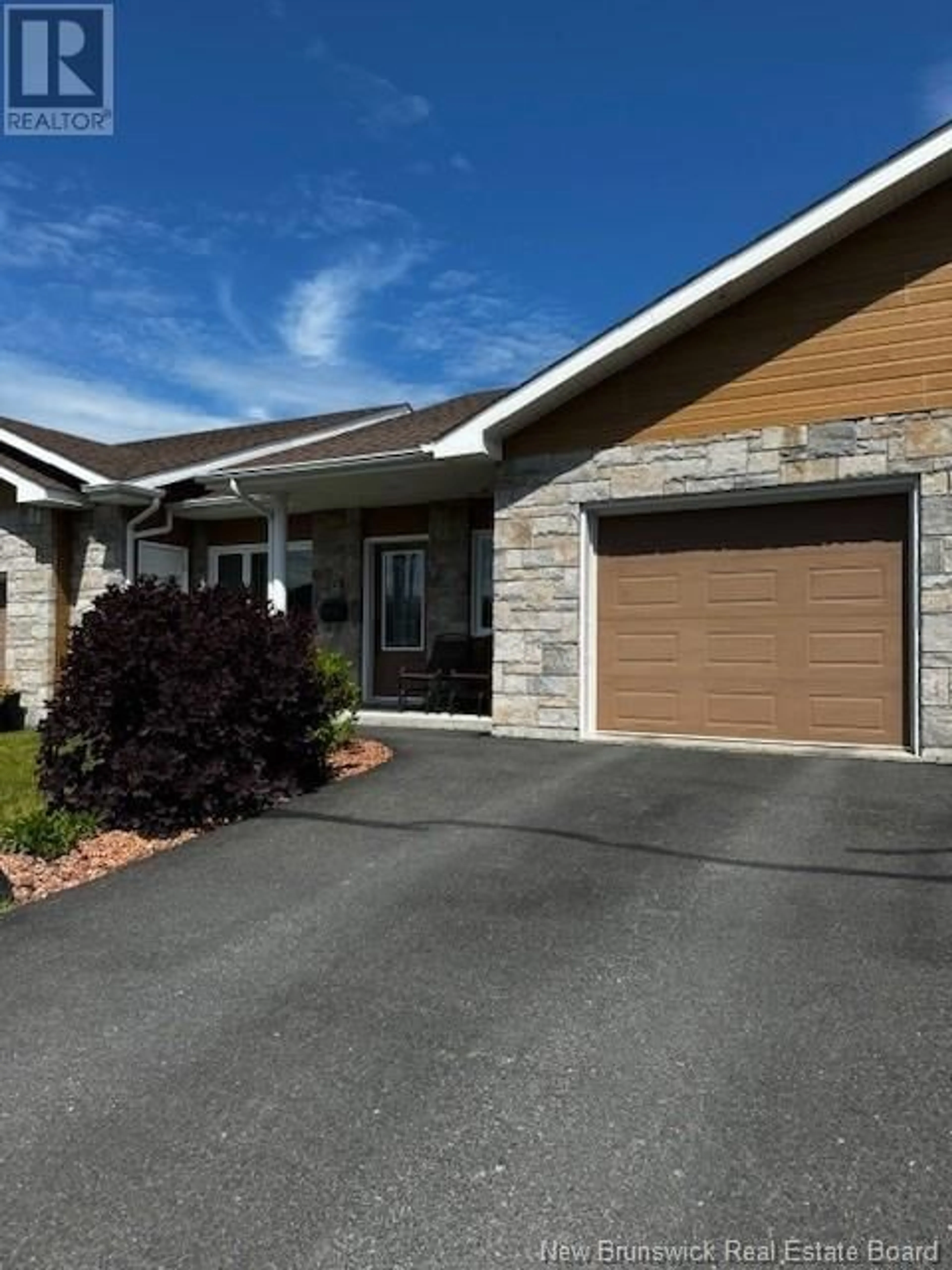 Home with vinyl exterior material, street for 28 REAL STREET, Edmundston New Brunswick E3V0B8