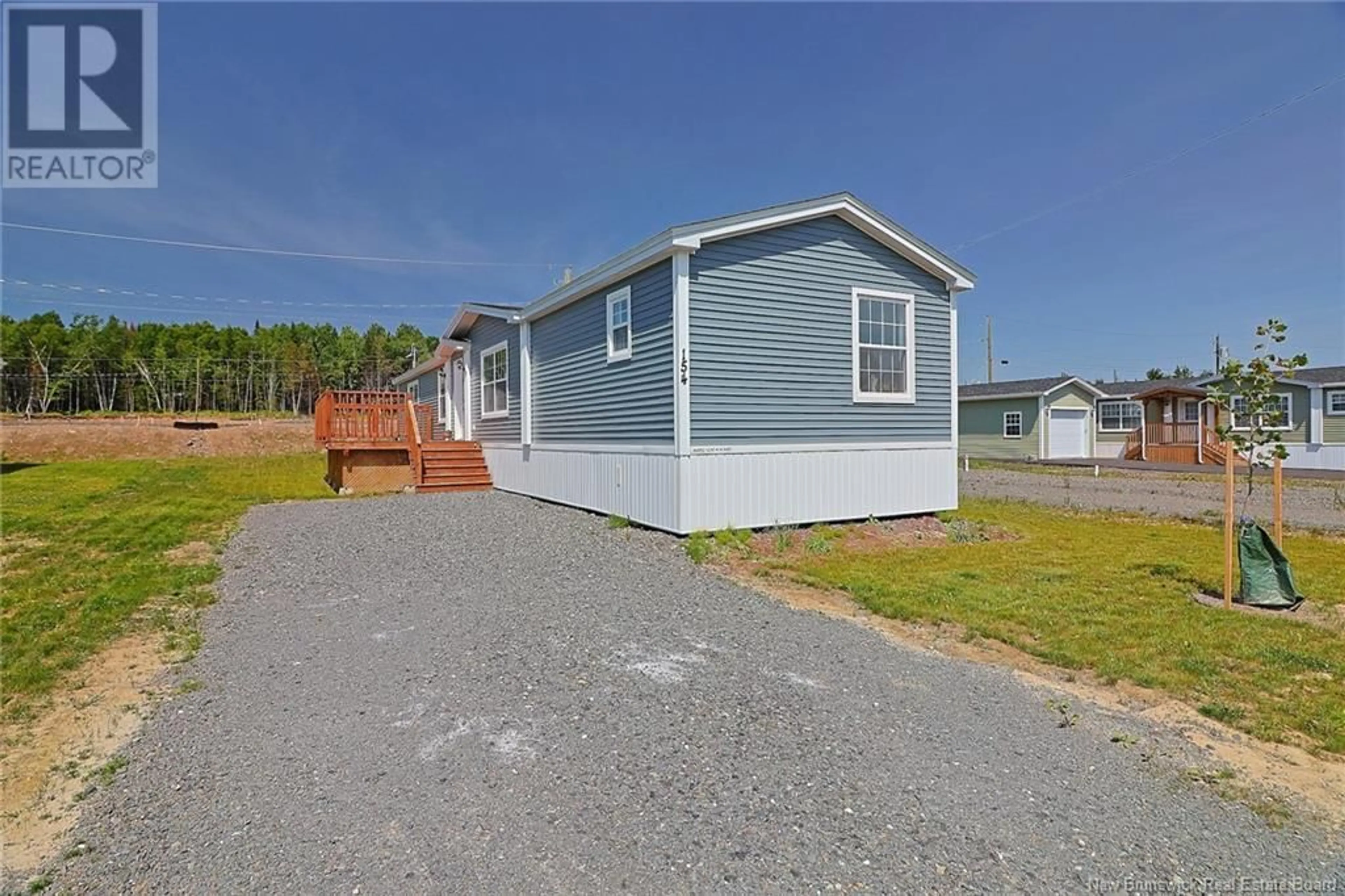 Home with vinyl exterior material for 154 Burns Street, Fredericton New Brunswick E3G4C8