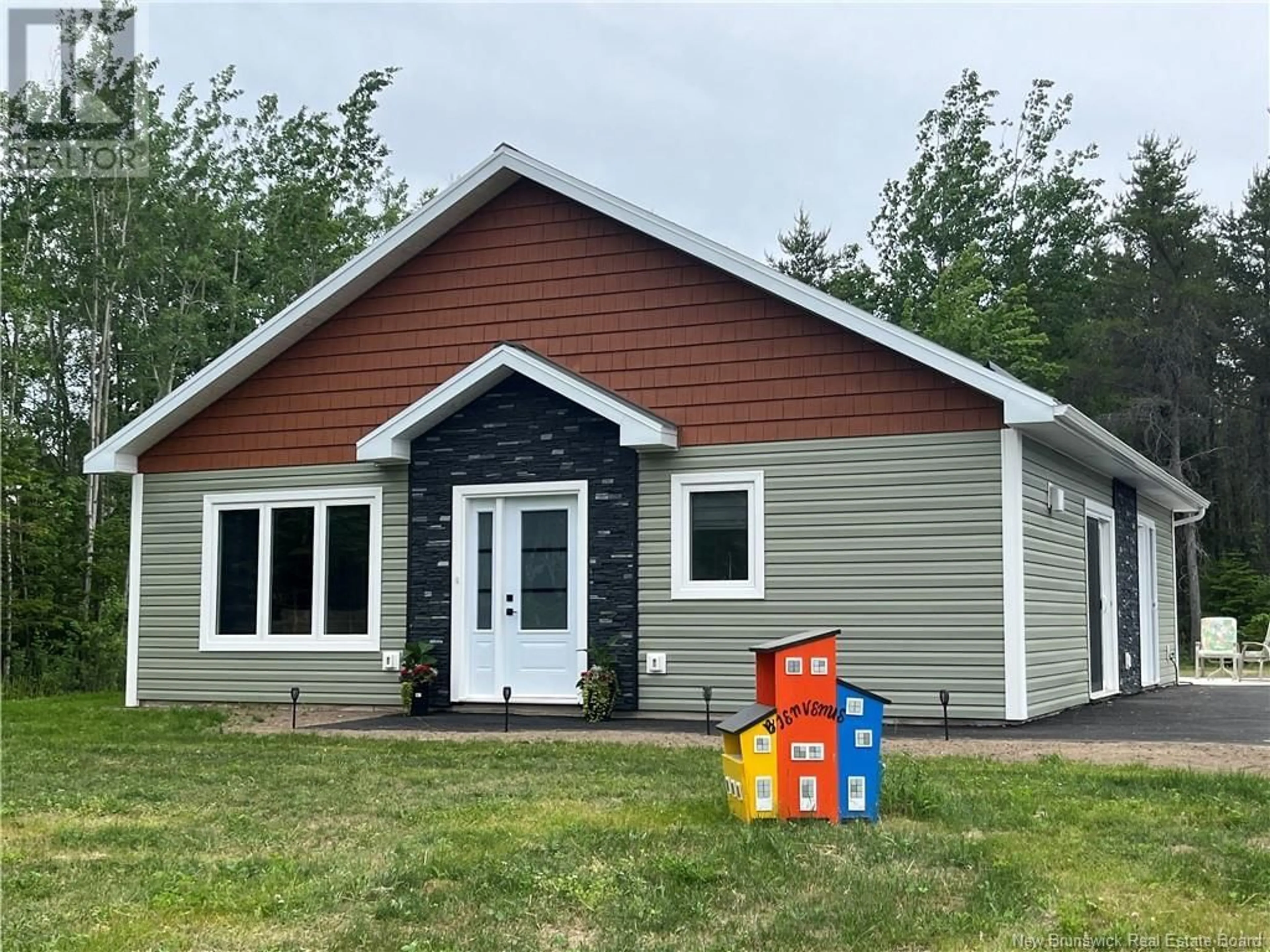 Home with vinyl exterior material for 1926 Route 365, Petit-Tracadie New Brunswick E1X3N6