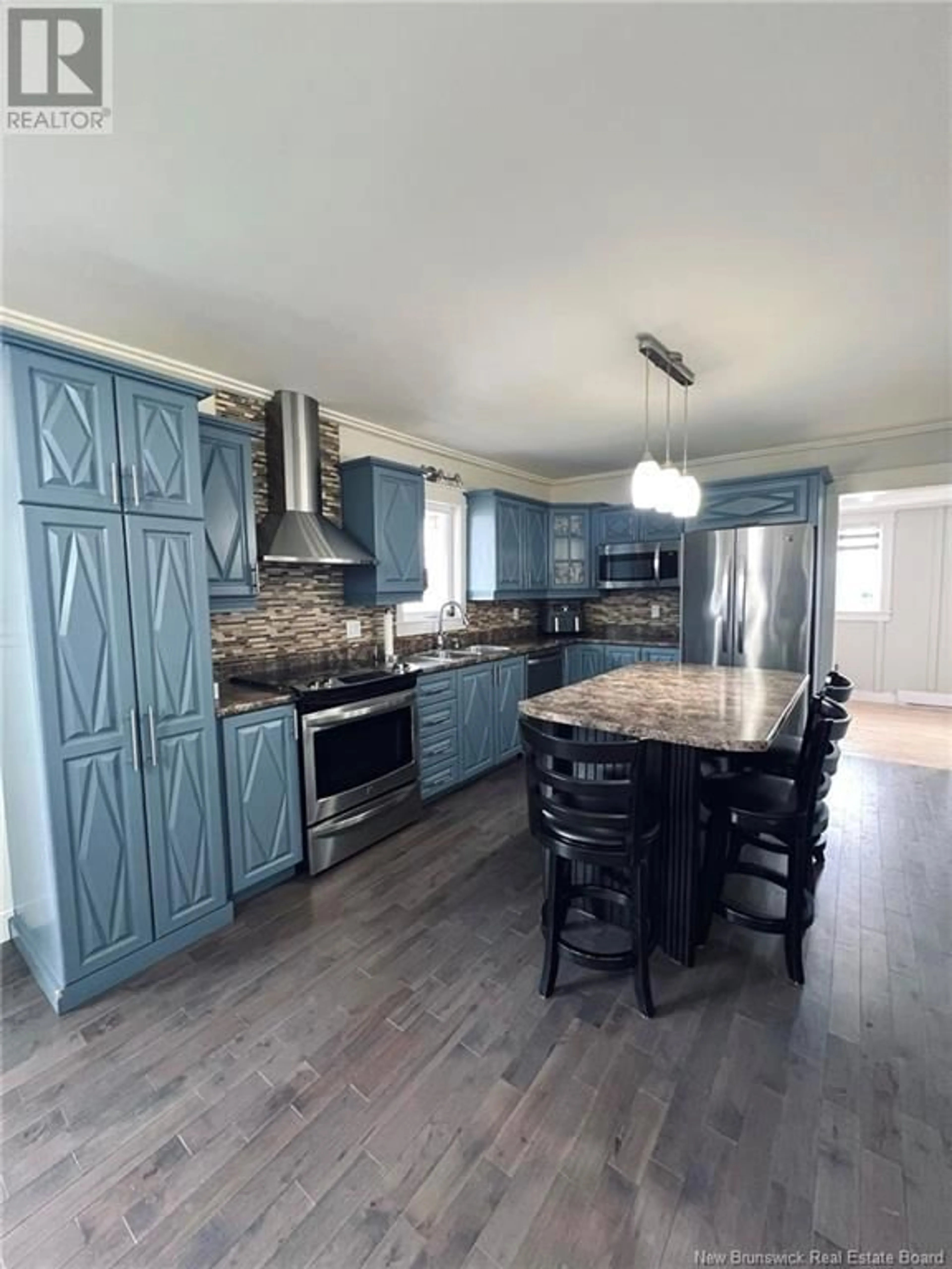 Open concept kitchen for 1 Savoie Street, Eel River Crossing New Brunswick E8E1T7