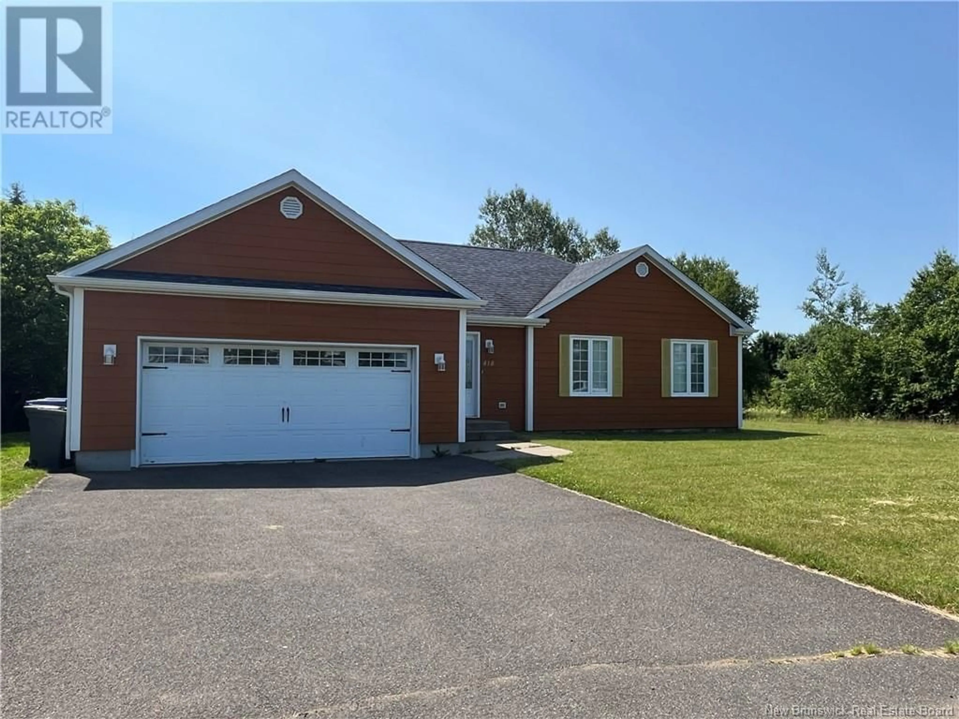 Home with brick exterior material for 418 Wade Street, Tracadie New Brunswick E1X1E2