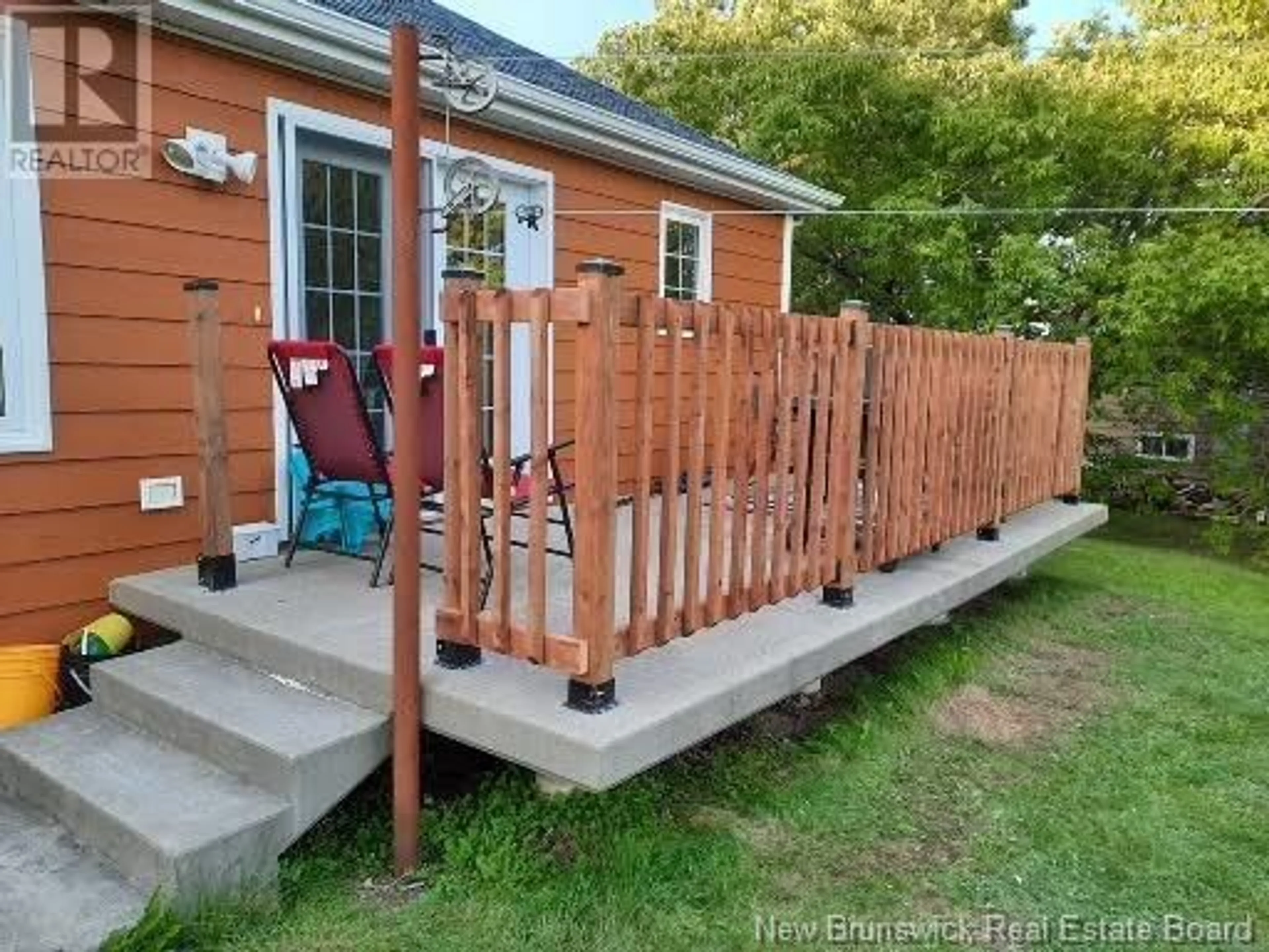 Patio, the fenced backyard for 418 Wade Street, Tracadie New Brunswick E1X1E2