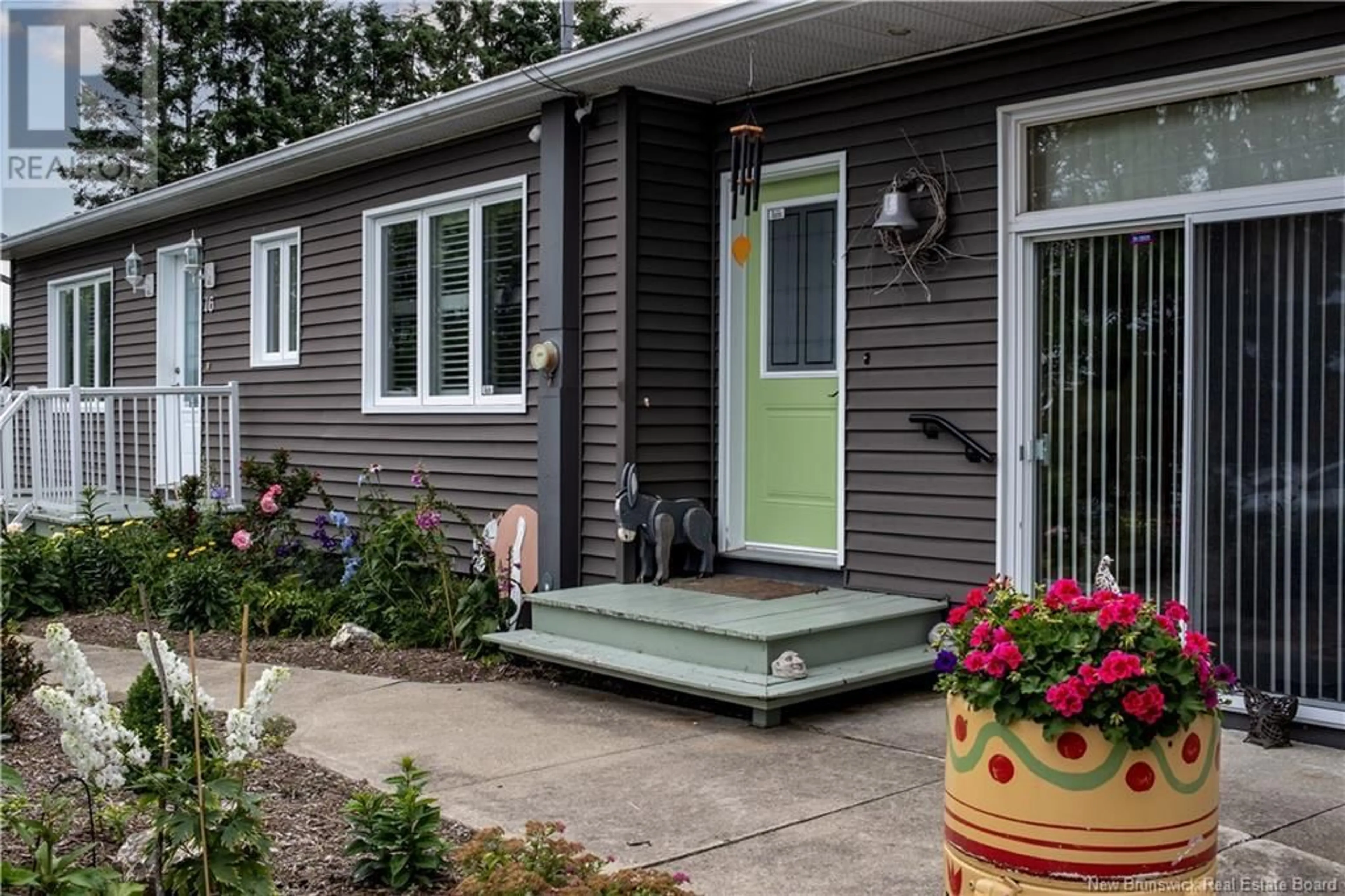 Home with vinyl exterior material for 16 Beaulieu Street, Grand-Sault/Grand Falls New Brunswick E3Y1C9