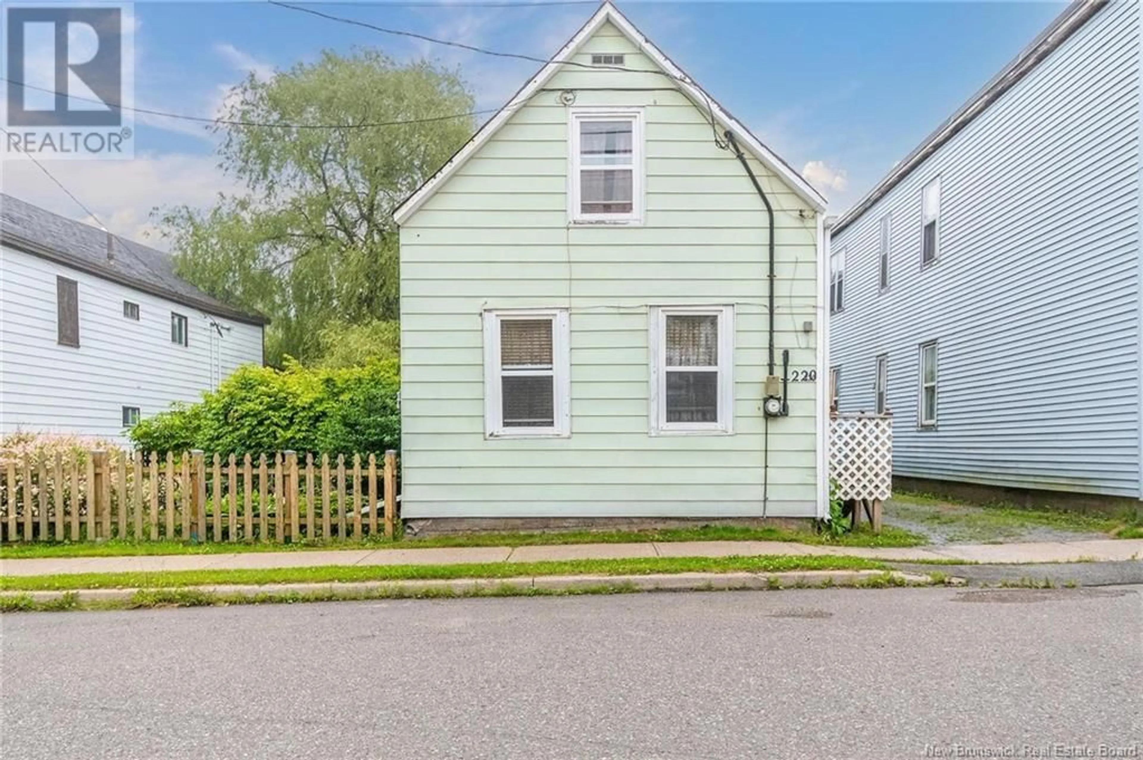 Frontside or backside of a home for 220 Rodney Street, Saint John New Brunswick E2M1X4