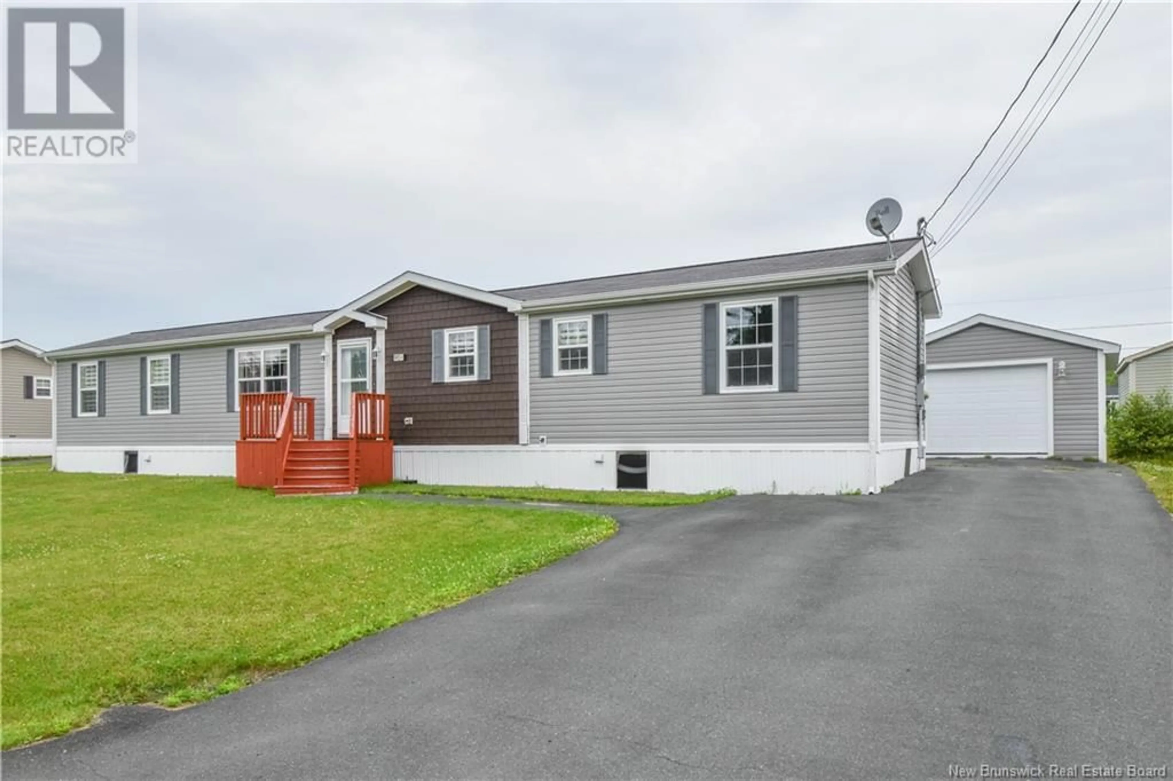 Home with vinyl exterior material for 901 Paul Street, Tracadie New Brunswick E1X1B8