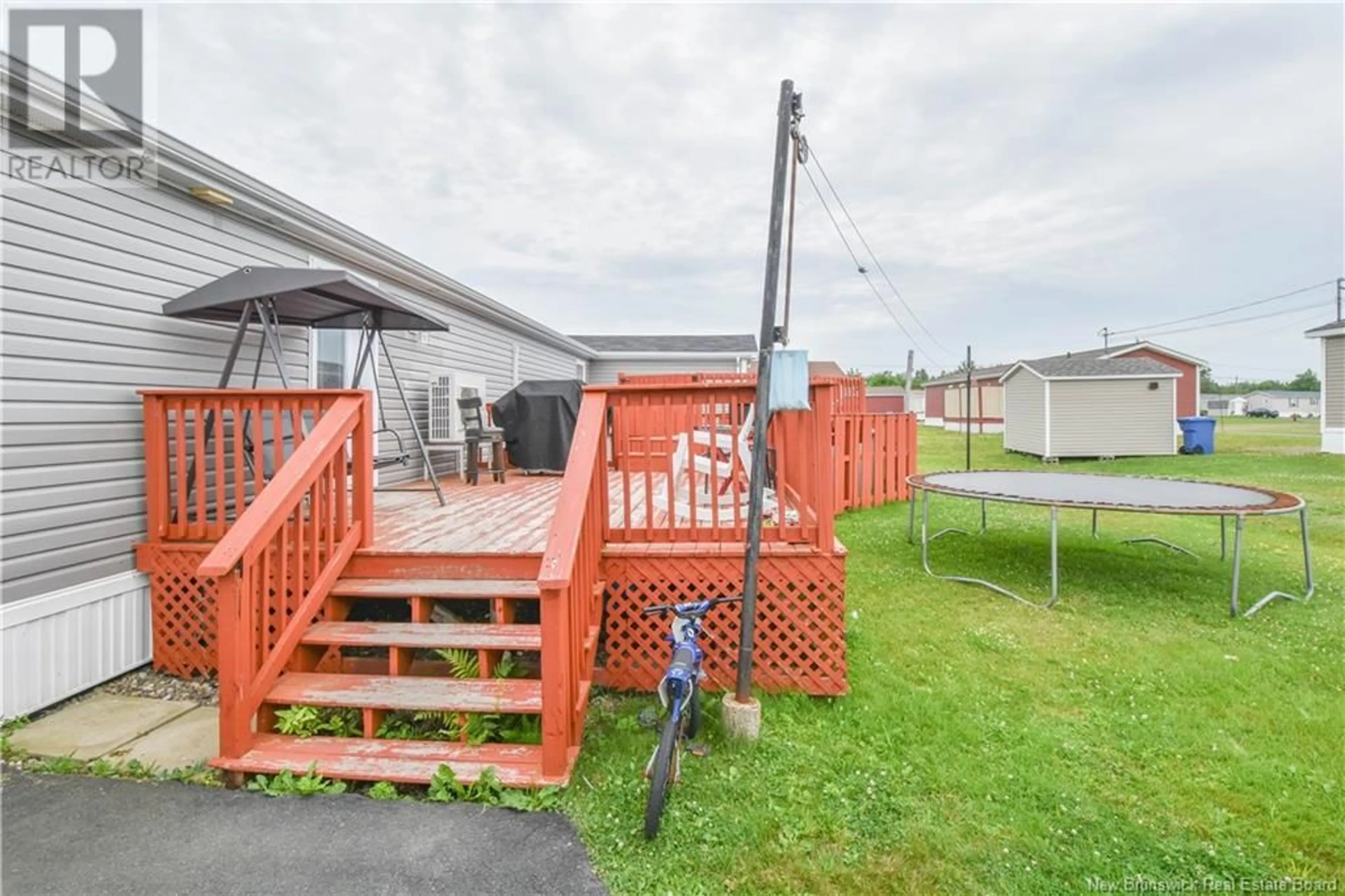 Patio, the fenced backyard for 901 Paul Street, Tracadie New Brunswick E1X1B8