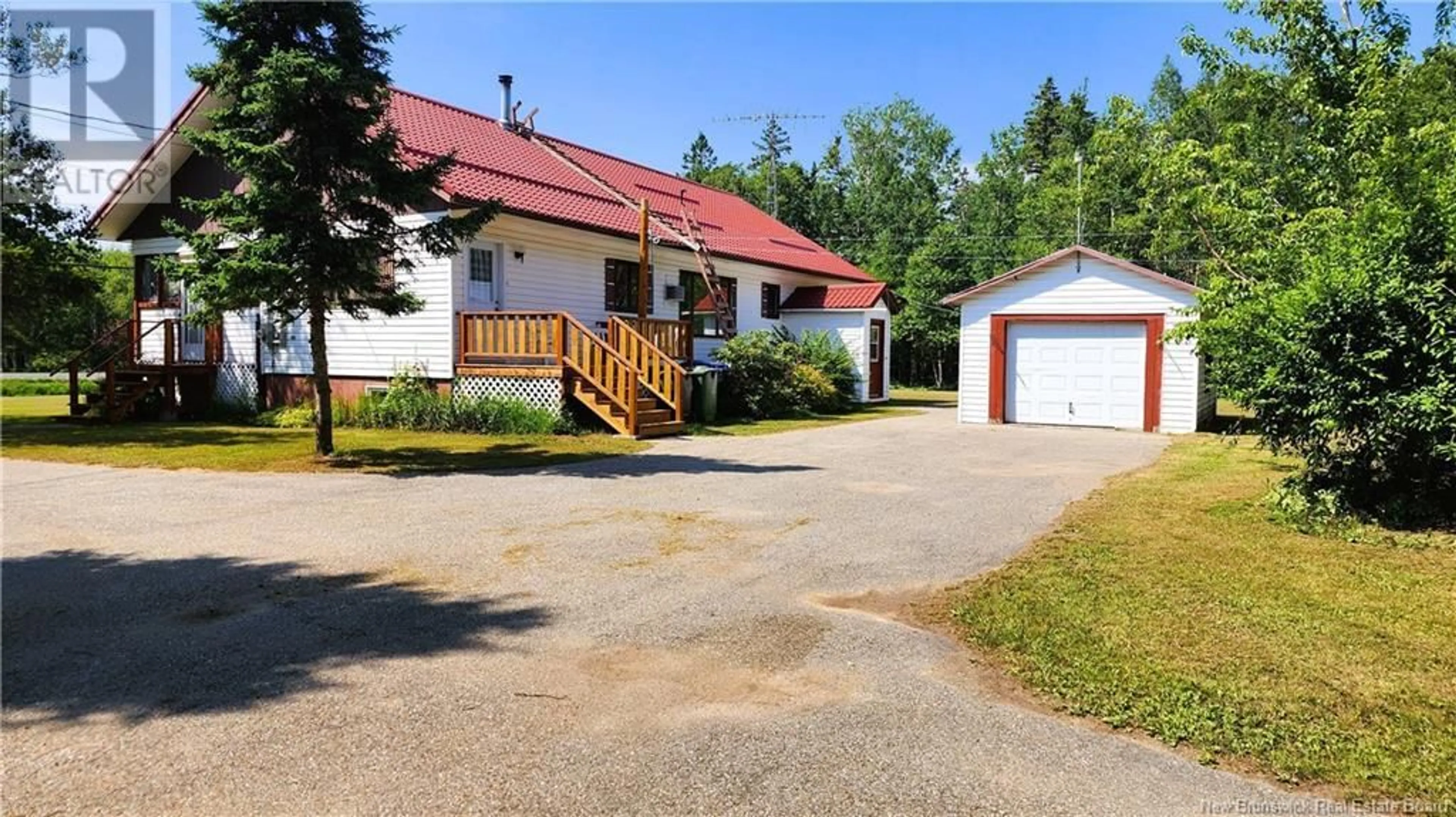 Frontside or backside of a home, cottage for 10228 Route 113 Route, Miscou New Brunswick E8T1Y6