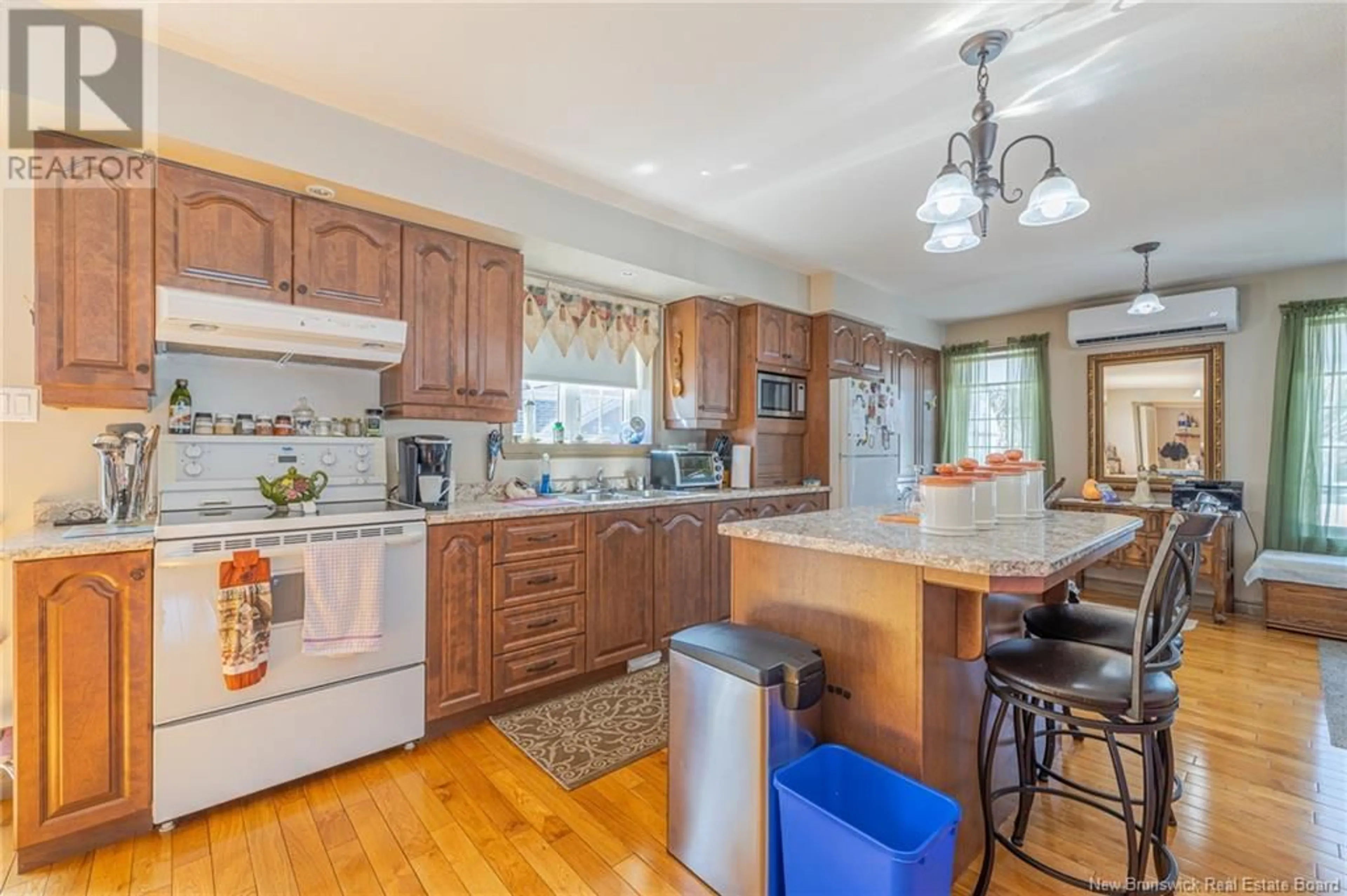 Open concept kitchen, wood/laminate floor for 2386 ROUTE 160, Saint-Sauveur New Brunswick E8L1P6