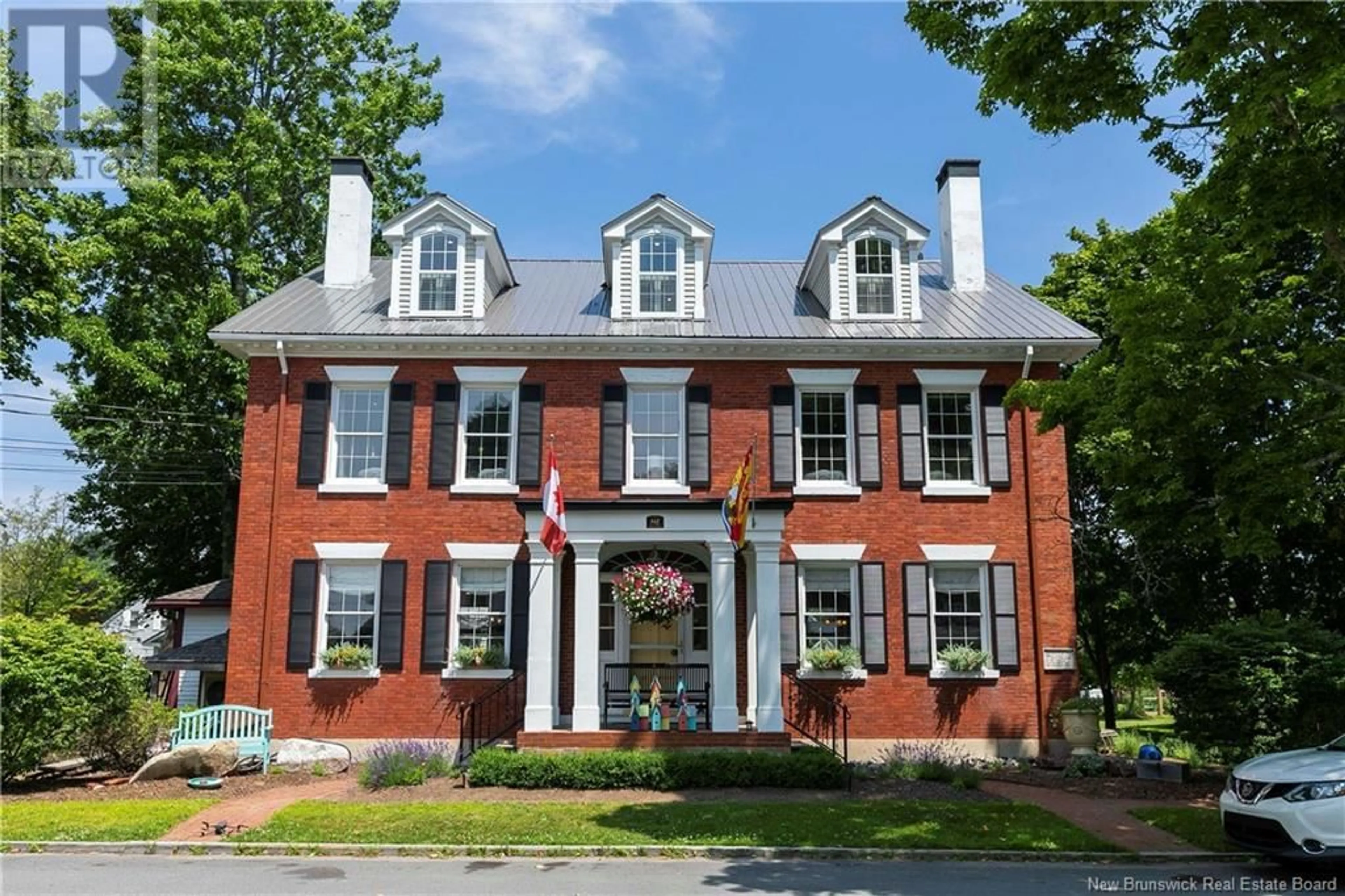 Home with brick exterior material for 142 Queen Street, Saint Andrews New Brunswick E5B1E2