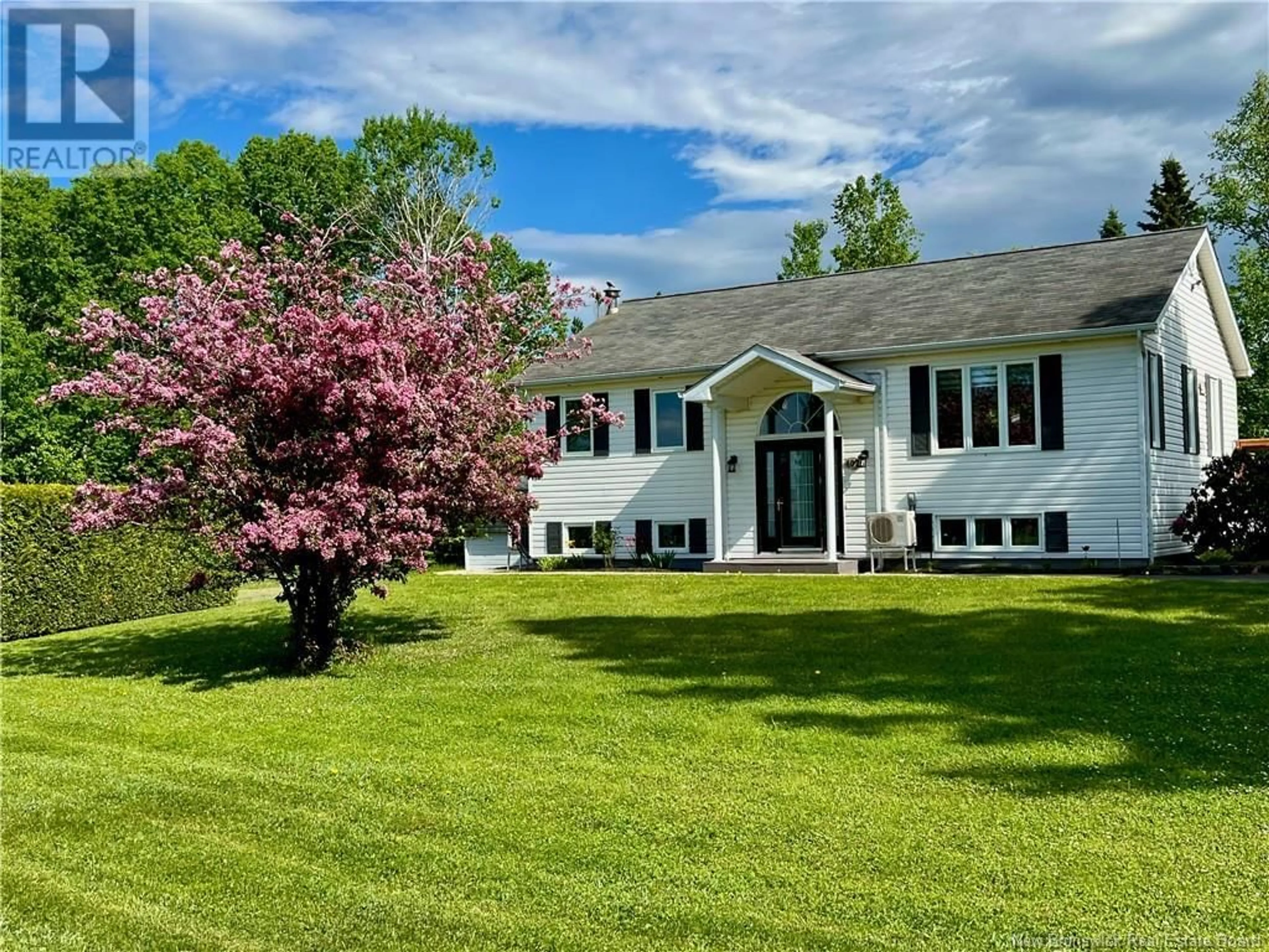 Frontside or backside of a home for 402 Rue Heritage, Beresford New Brunswick E8K2E3