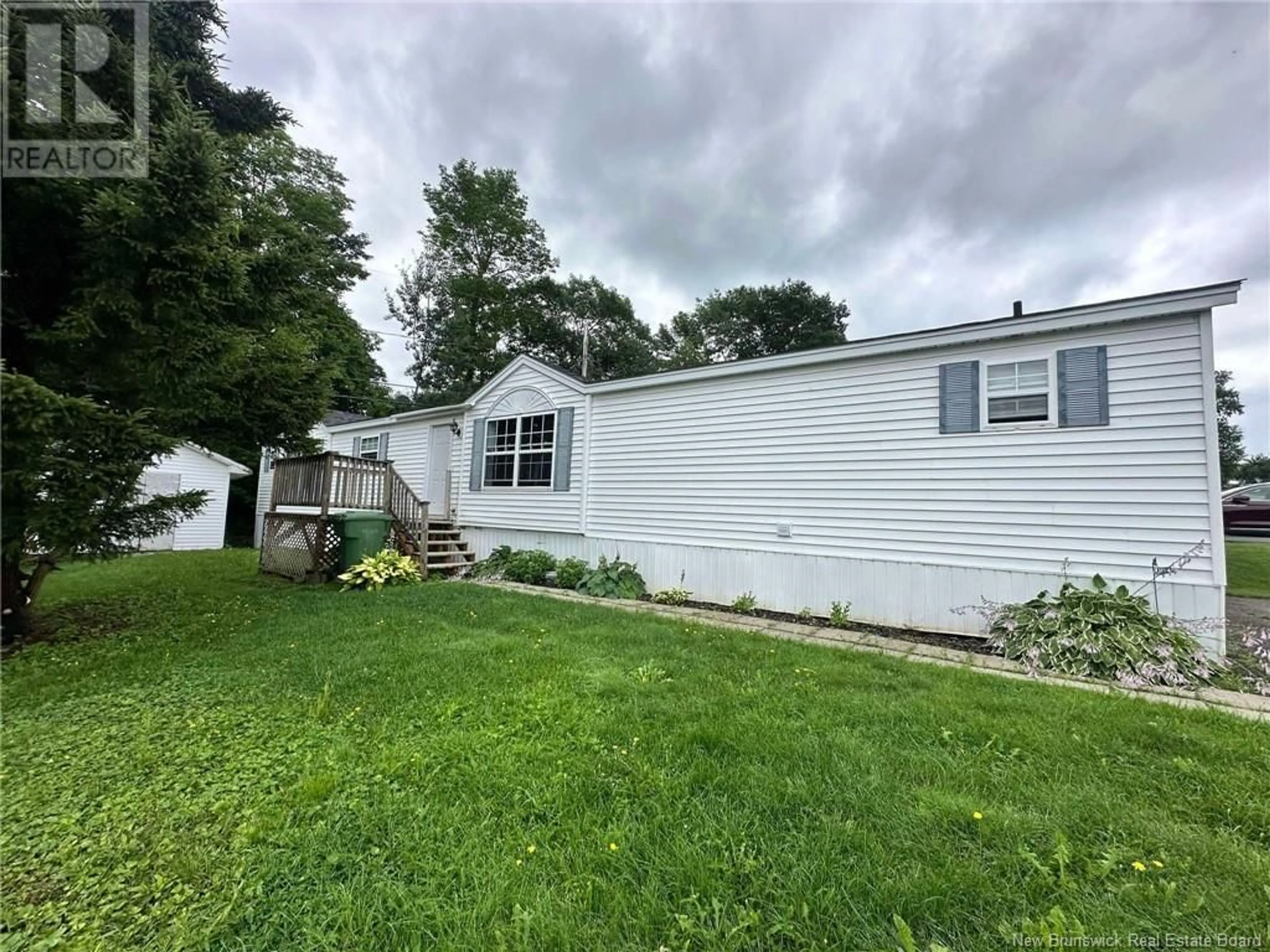 Frontside or backside of a home for 26 MacIntosh Street, Fredericton New Brunswick E3C1L8