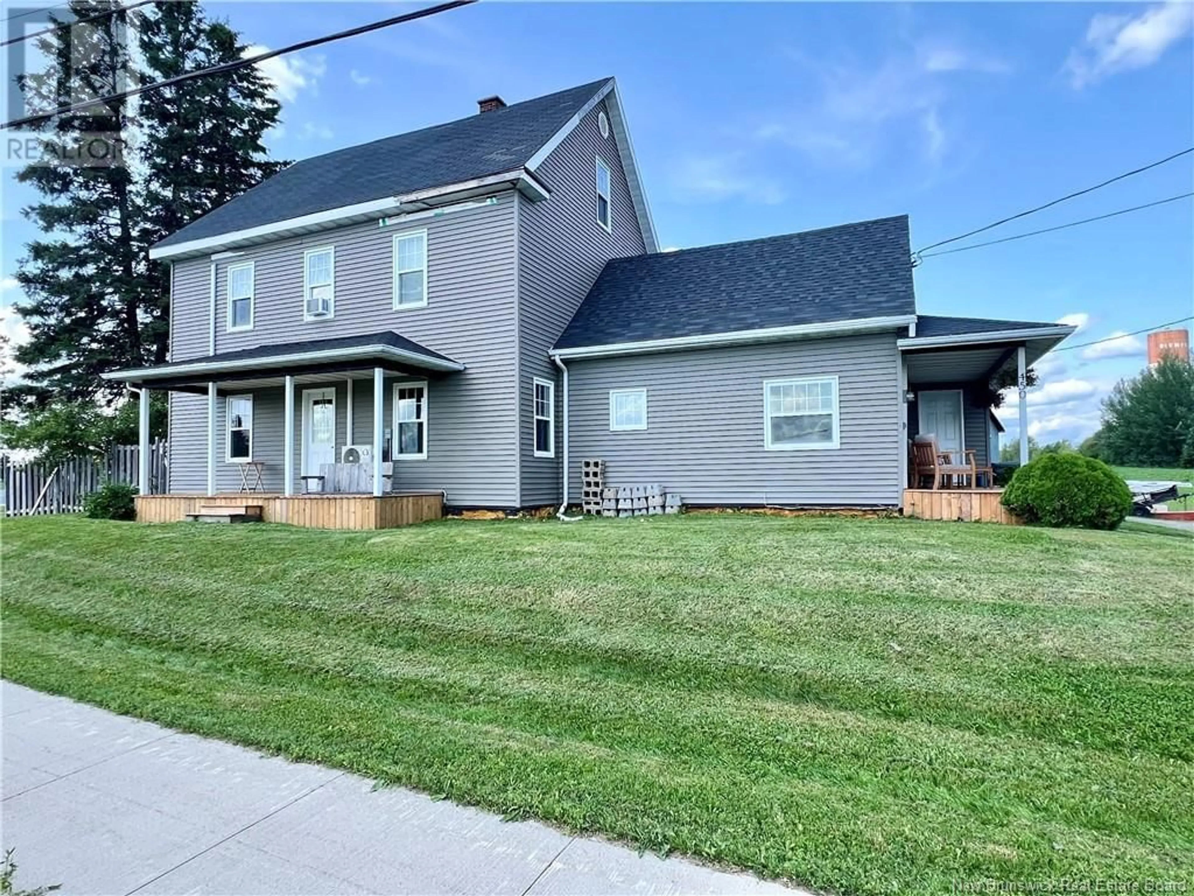 Home with vinyl exterior material, street for 450 DE L'EGLISE ROAD, Saint-André New Brunswick E3Y2Y8