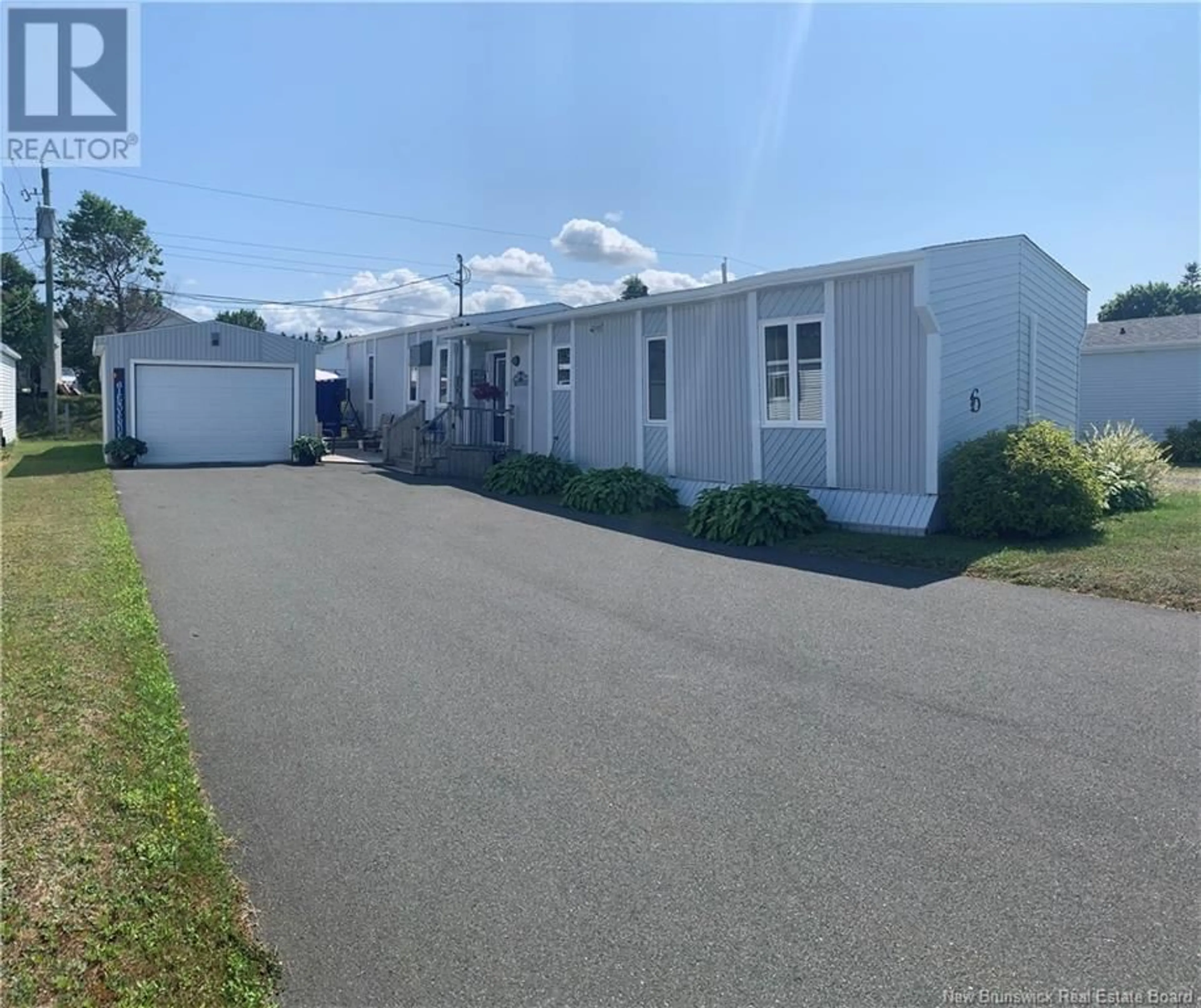 A pic from exterior of the house or condo, the street view for 6 2E AV DU PARC, Caraquet New Brunswick E1W1A7