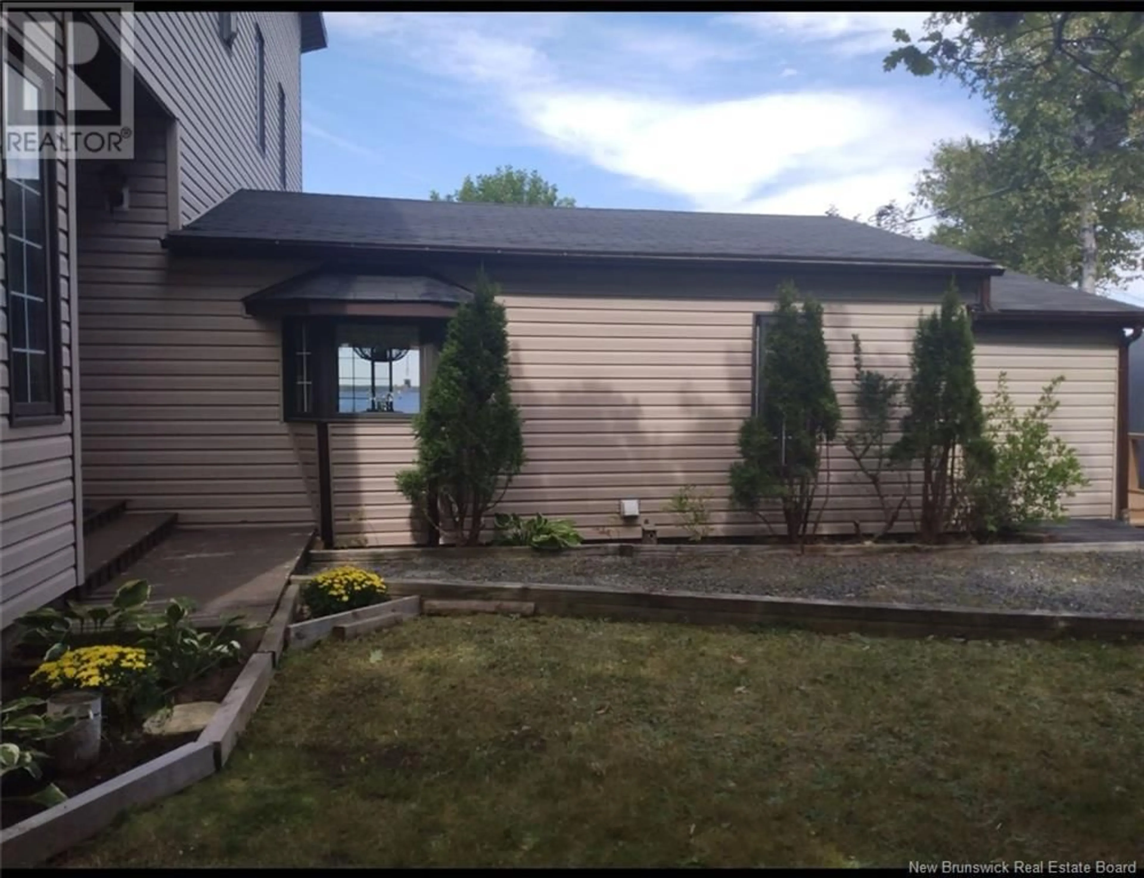 Home with vinyl exterior material, street for 69 SCHOONER POINT ROAD, Napan New Brunswick E1N4V6
