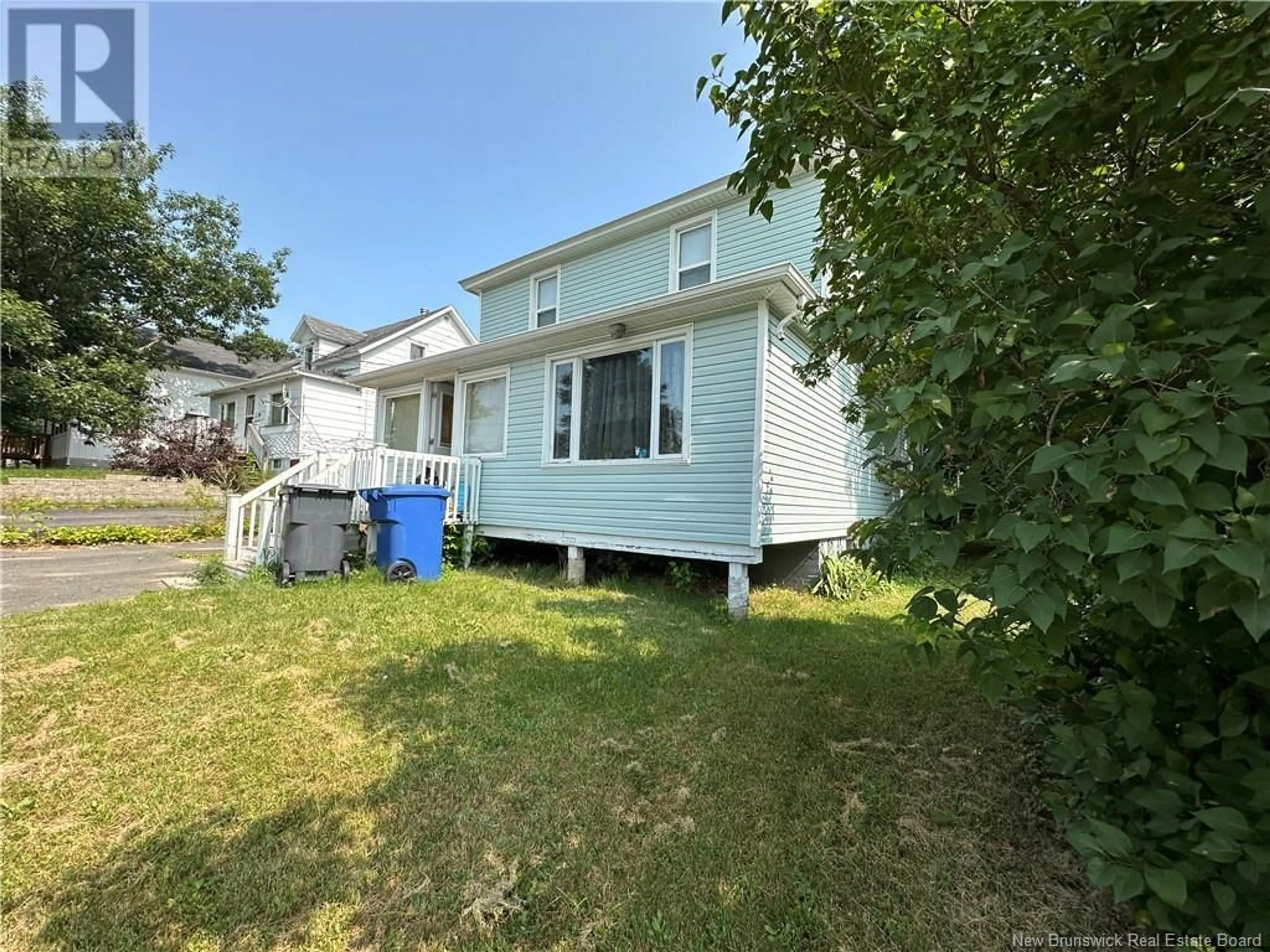 Frontside or backside of a home, the fenced backyard for 107 Young Street, Bathurst New Brunswick E2A2K7