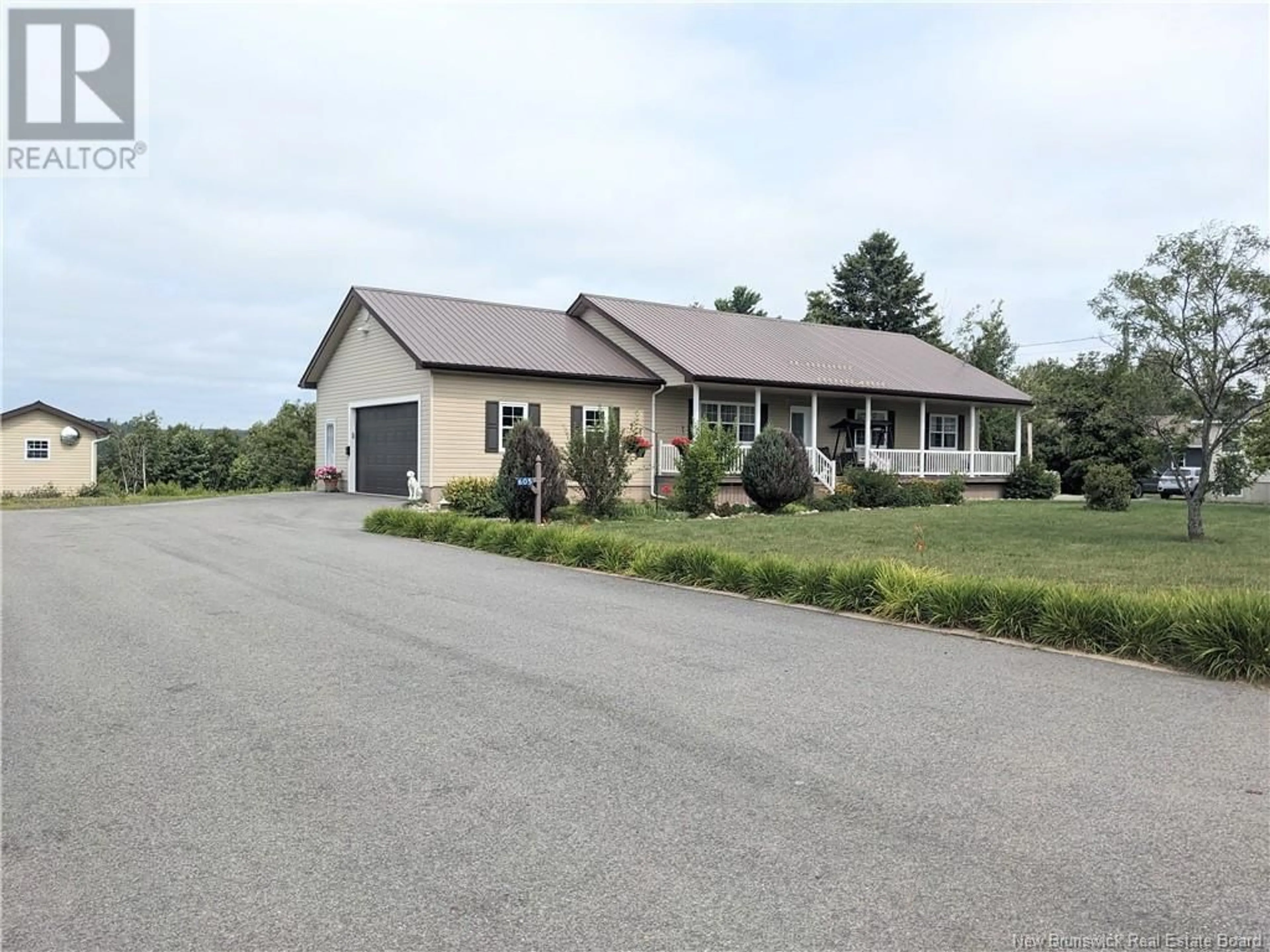 Frontside or backside of a home, the street view for 605 Water Street, Miramichi New Brunswick E1N4B9