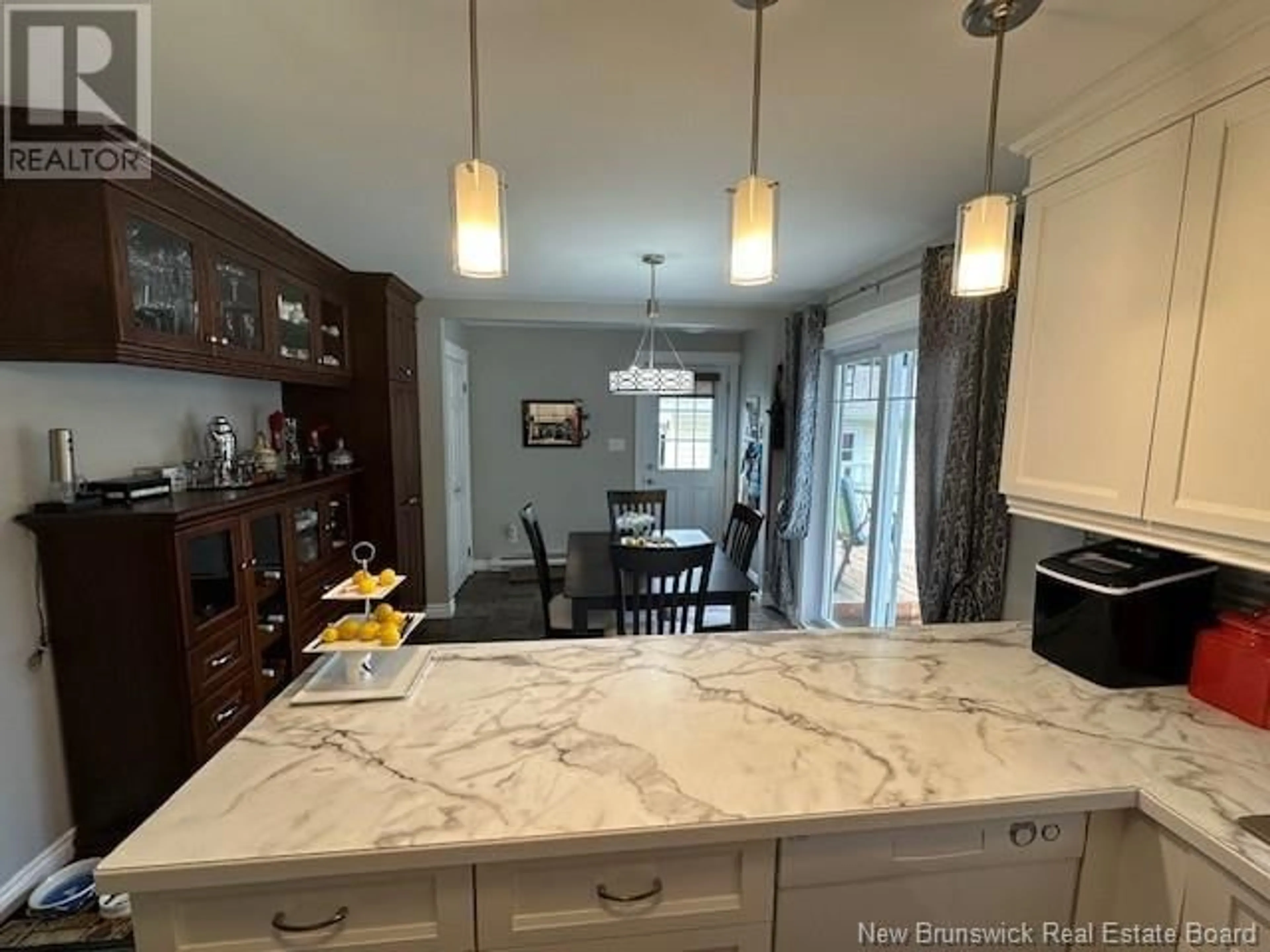 Open concept kitchen for 55 Duncan Street, Tide Head New Brunswick E3N4M5