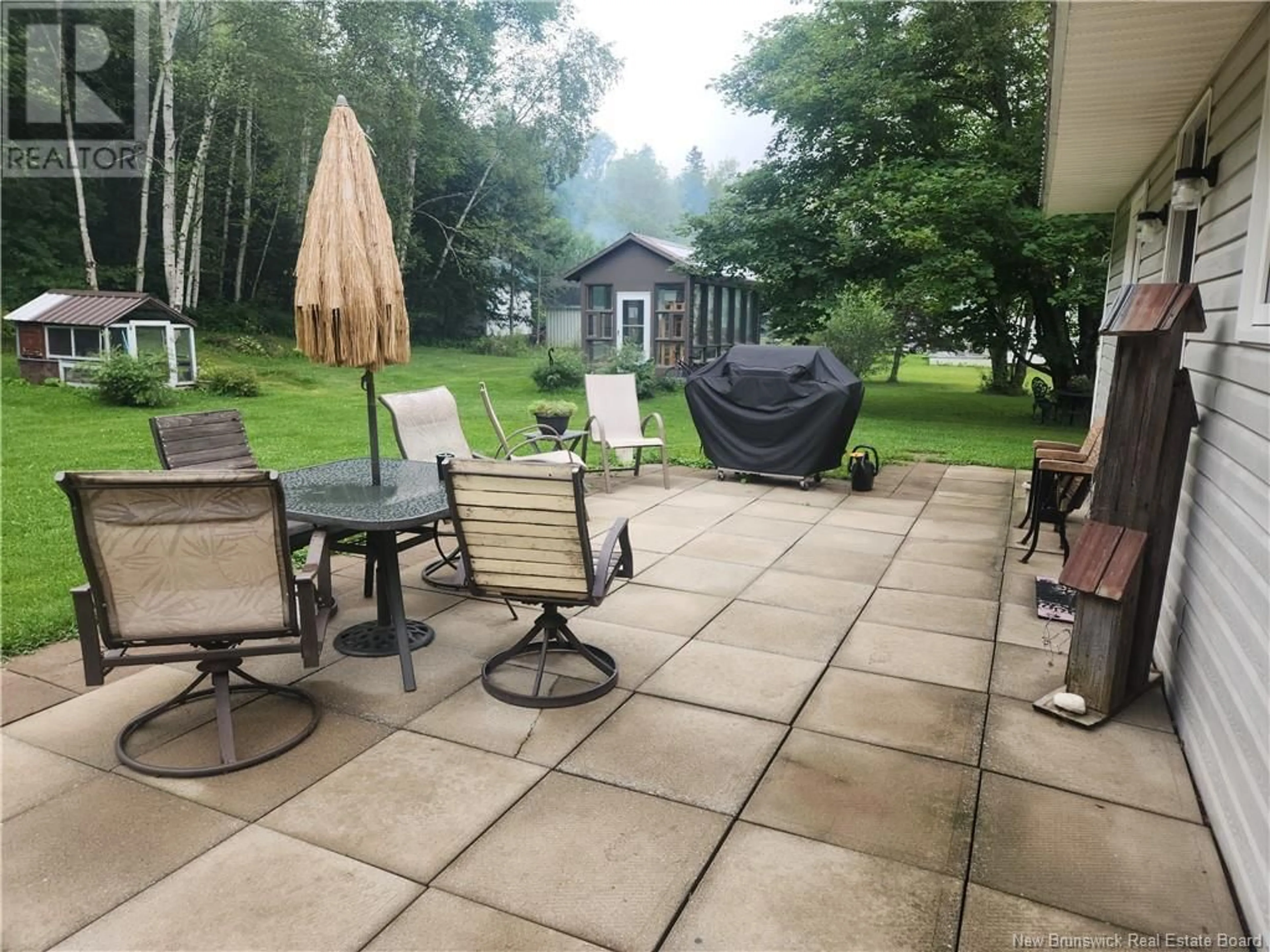 Patio, the fenced backyard for 16032 Route 105, DSL de Drummond/DSL of Drummond New Brunswick E3Y2H9