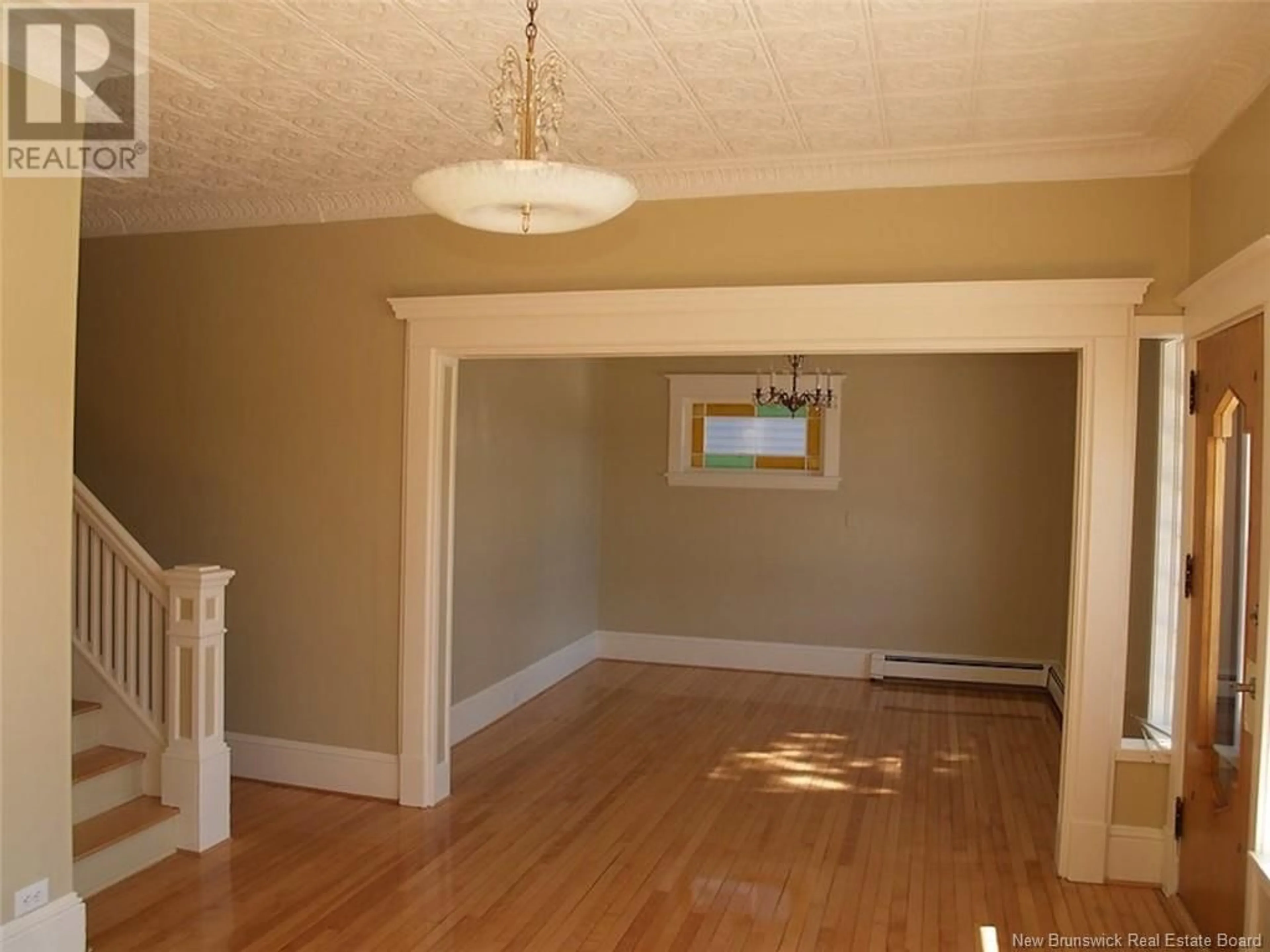 A pic of a room, wood floors for 249 St-François Street, Edmundston New Brunswick E3V1G2