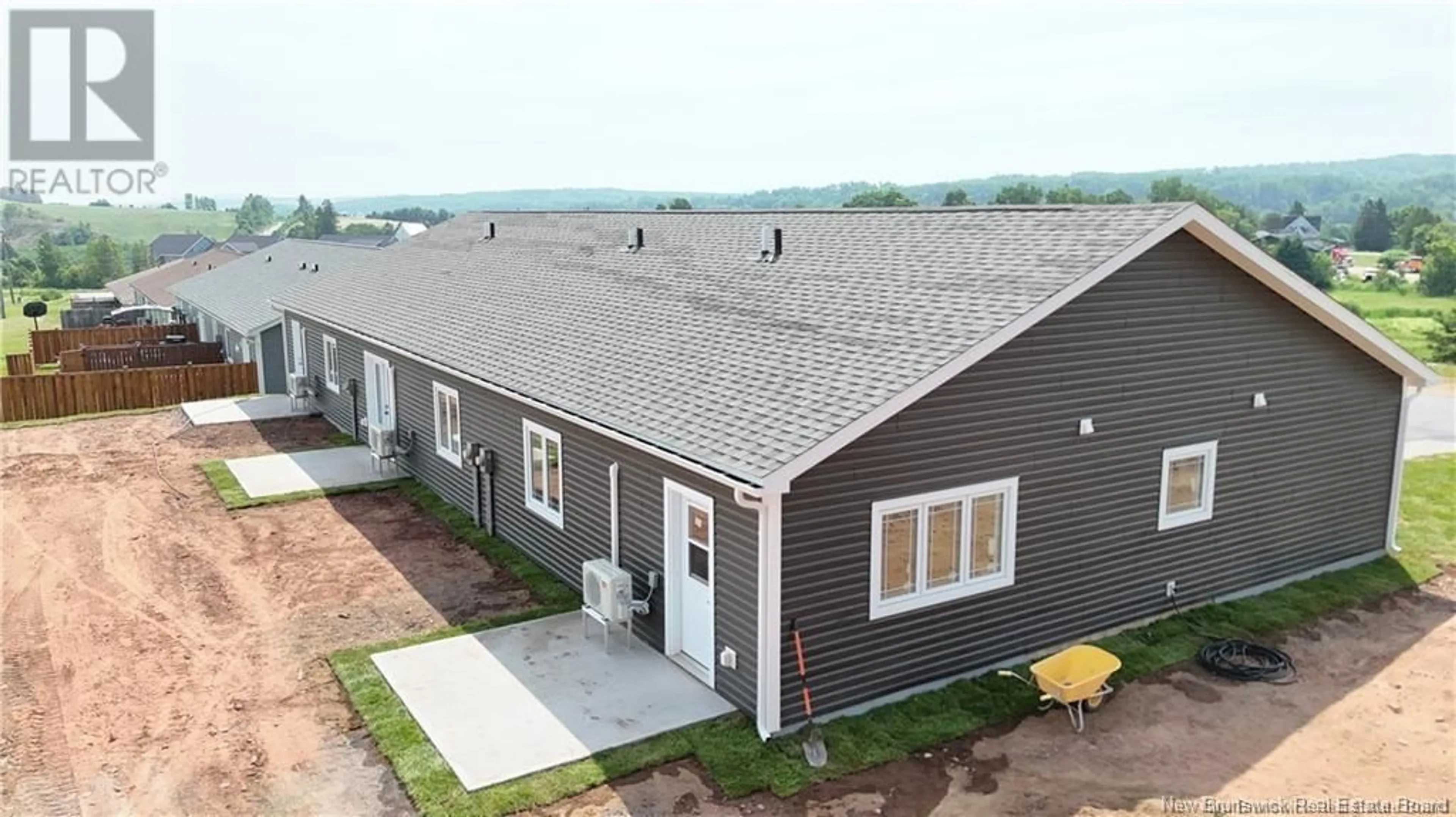 Home with vinyl exterior material for Condo 1 King Fisher Lane, Apohaqui New Brunswick E5P3G2