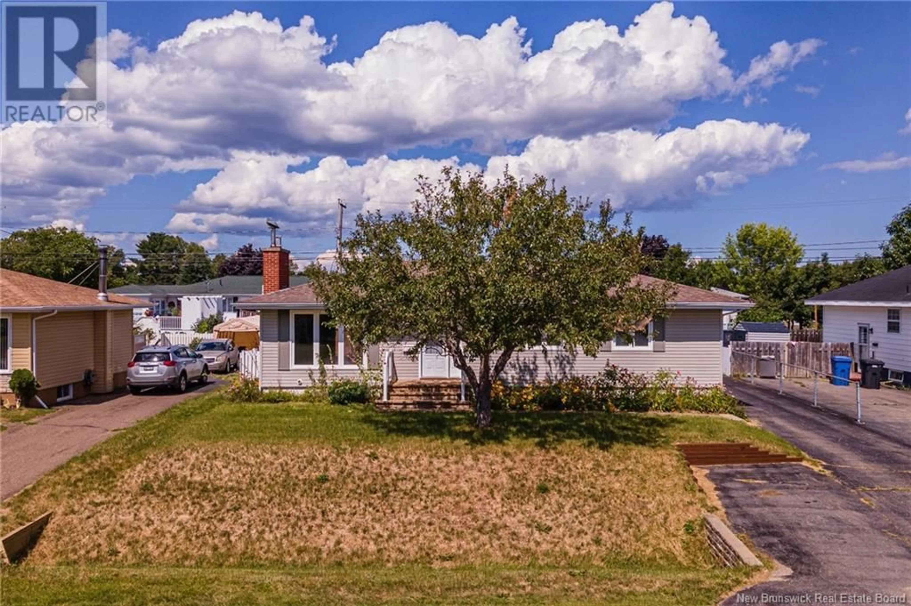 Frontside or backside of a home, the fenced backyard for 1130 Rockland Drive, Bathurst New Brunswick E2A3T9