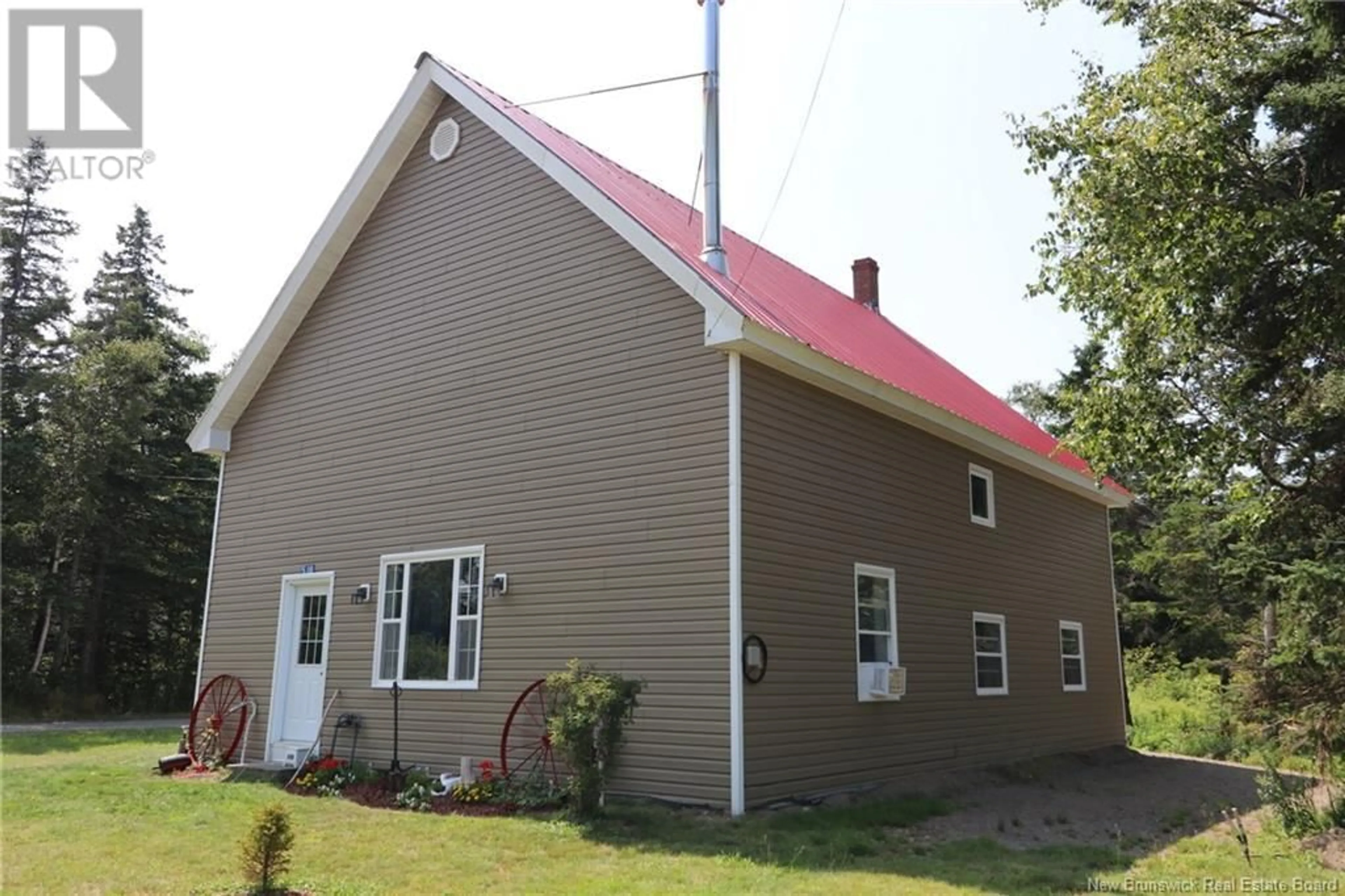 Frontside or backside of a home, the front or back of building for 518 Route 776, Grand Manan New Brunswick E5G2C9