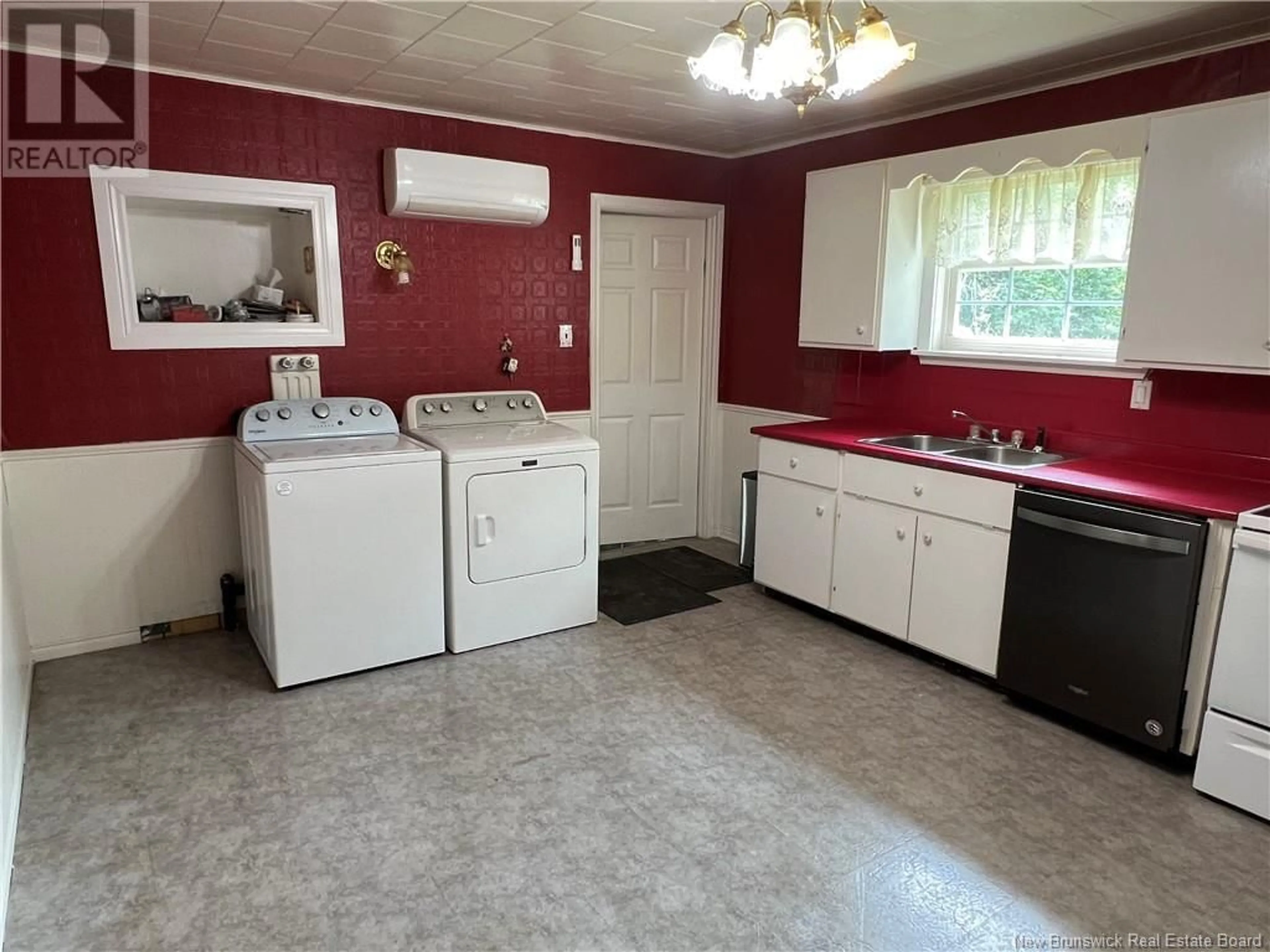 Kitchen with laundary machines, unknown floor for 60 Upton Road, East Centreville New Brunswick E7K3C9