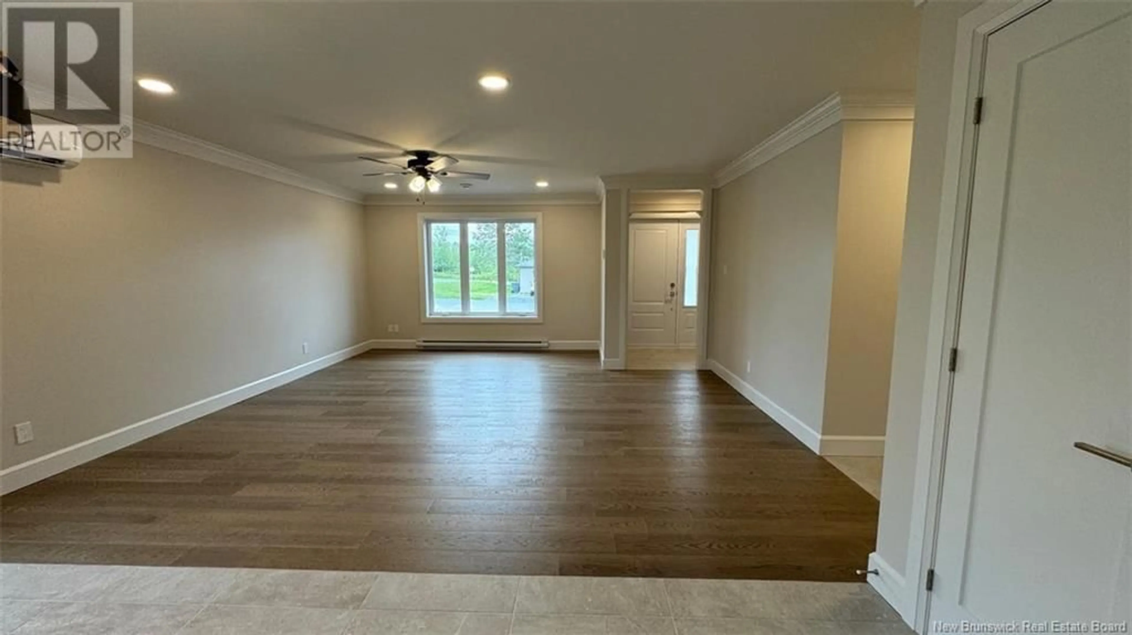 A pic of a room, wood floors for 4 Honore Roy Street, Saint-Léonard New Brunswick E7E2C4